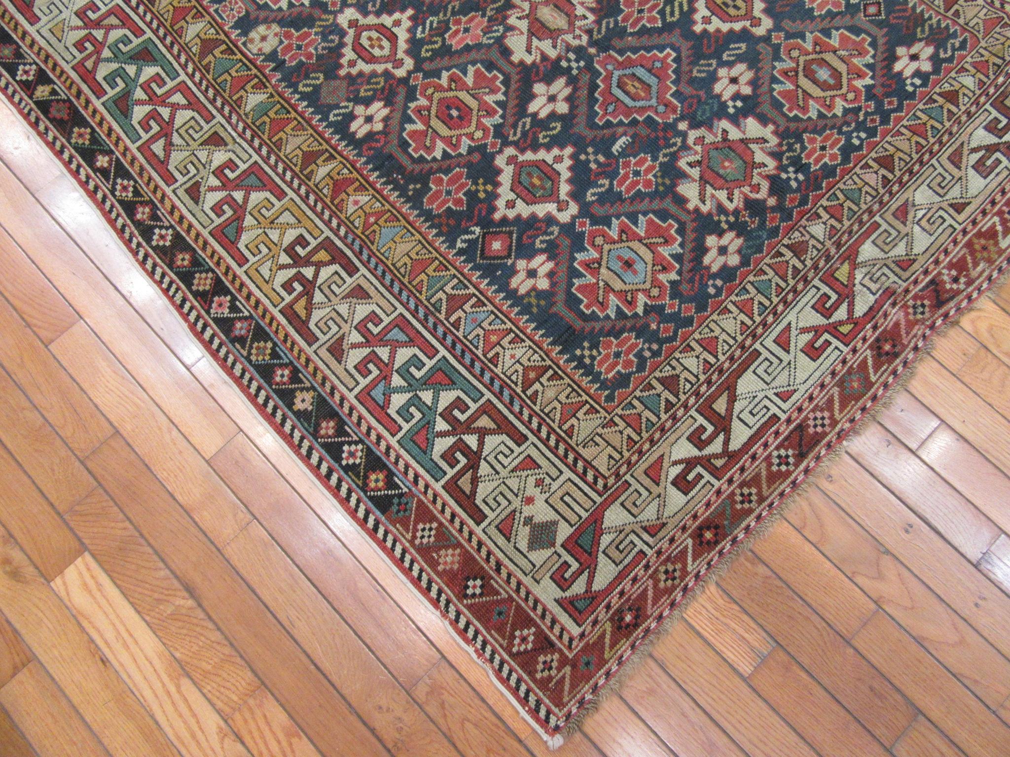 Wool Antique Hand Knotted Gallery Size Caucasian Rug For Sale