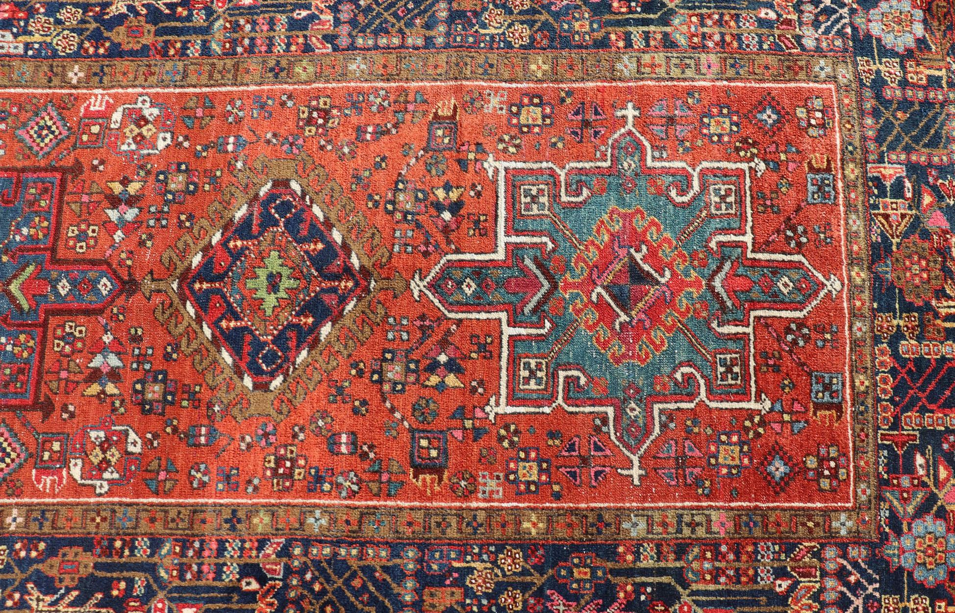 20th Century Antique Hand Knotted Geometric Persian Long Heriz Runner in Red, Blue and Teal For Sale