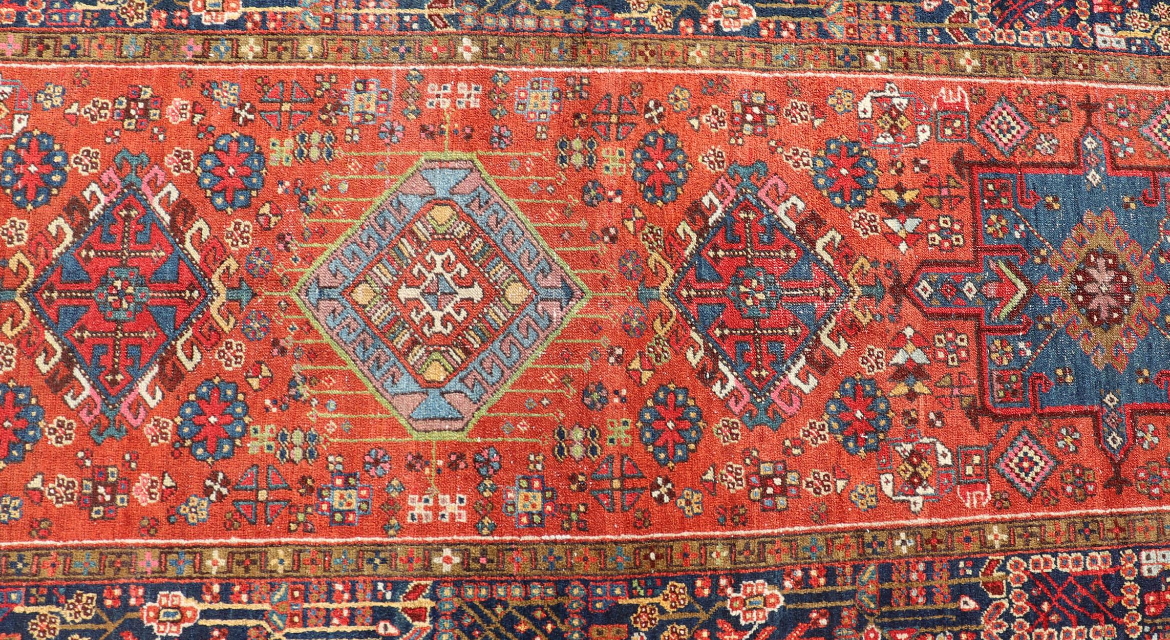 Wool Antique Hand Knotted Geometric Persian Long Heriz Runner in Red, Blue and Teal For Sale
