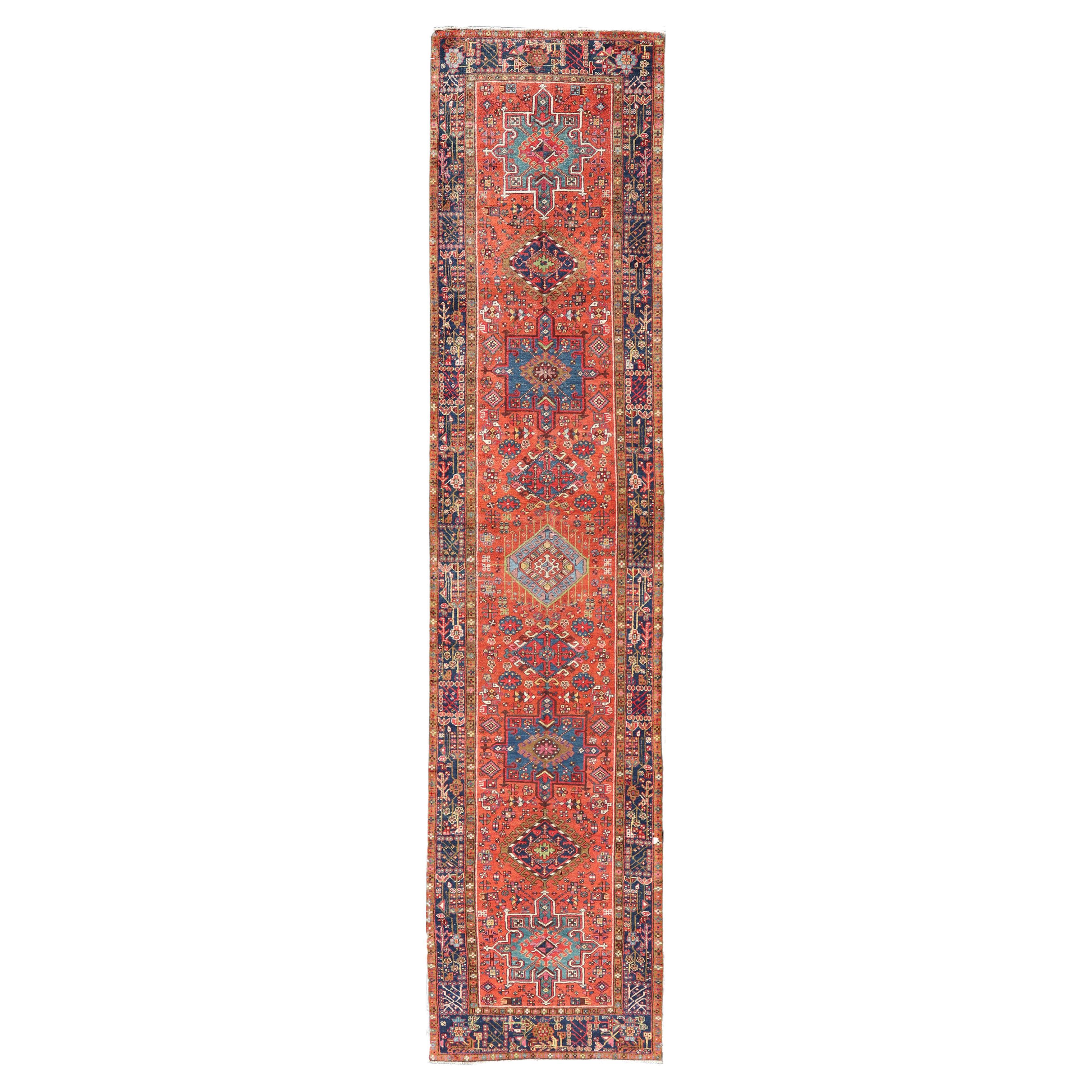 Antique Hand Knotted Geometric Persian Long Heriz Runner in Red, Blue and Teal For Sale