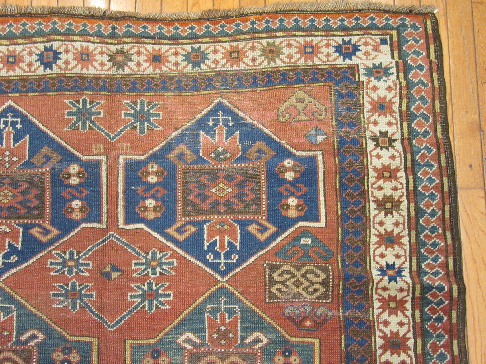 Wool Antique Hand Knotted Kazak Rug For Sale