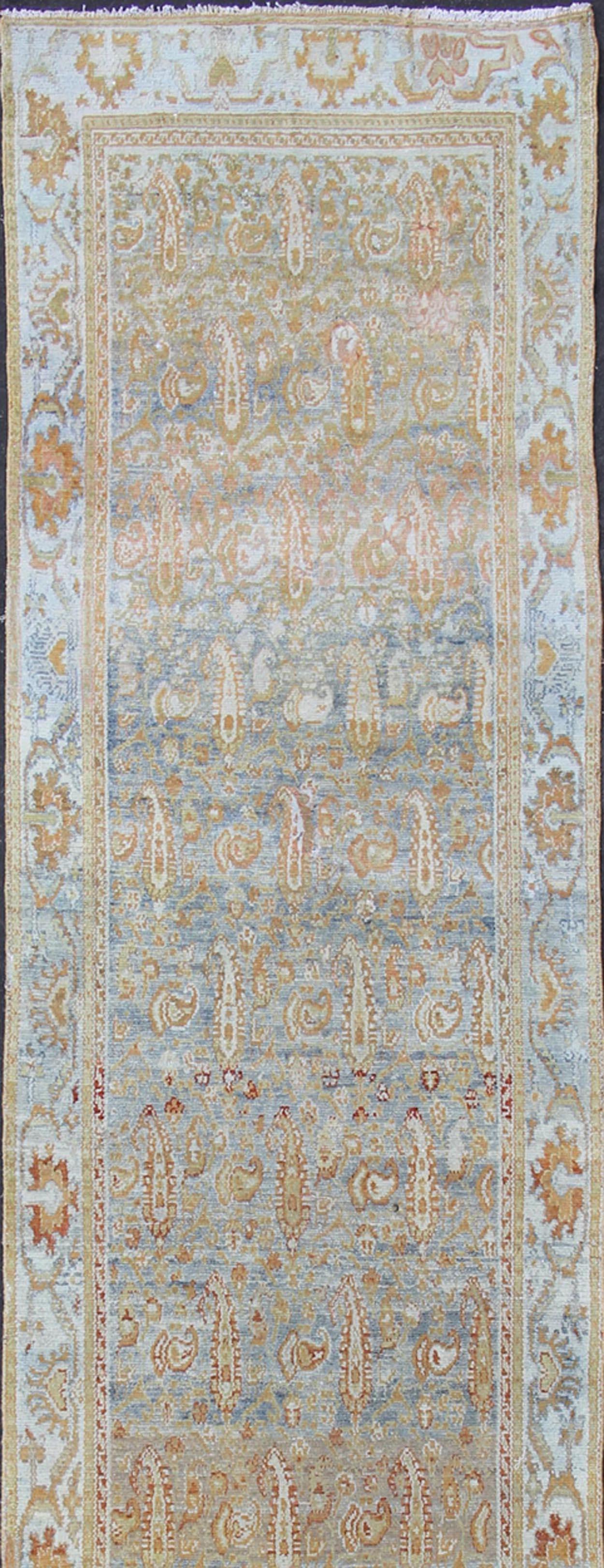Long kurdish runner with small pattern in all-over design. Fine kurdish Runner in soft tones of blue, salmon, pink, peach and orange and earthy tones. Antique kurdish rug with sub geometric and sub floral motifs, rug SUS-2012-1075, Keivan Woven Arts