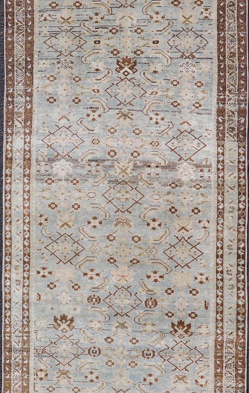 Measures: 3'5 x 12'5
Antique Hand-Knotted Persian Hamadan Runner with All-Over Tribal Design. Keivan Woven Arts; rug EN-14915; country of origin / type: Persian / Hamadan, circa 1920.

This antique hand-knotted Persian Hamadan runner features an