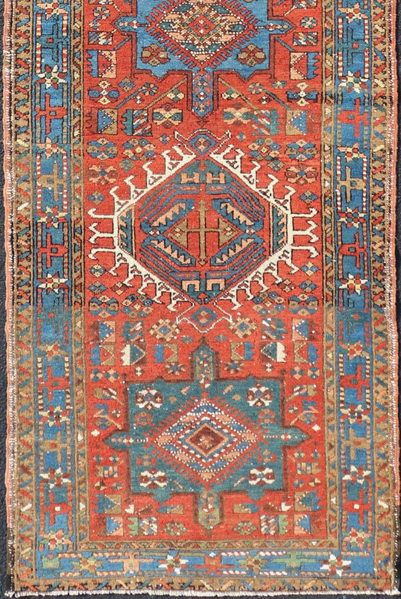Antique Heriz runner with all-over medallion design with geometric motifs, Keivan Woven Arts / rug EMB-9520-P13053, country of origin / type: Persian / Heriz, circa Early-20th Century.

Measures: 3'0 x 11'1.