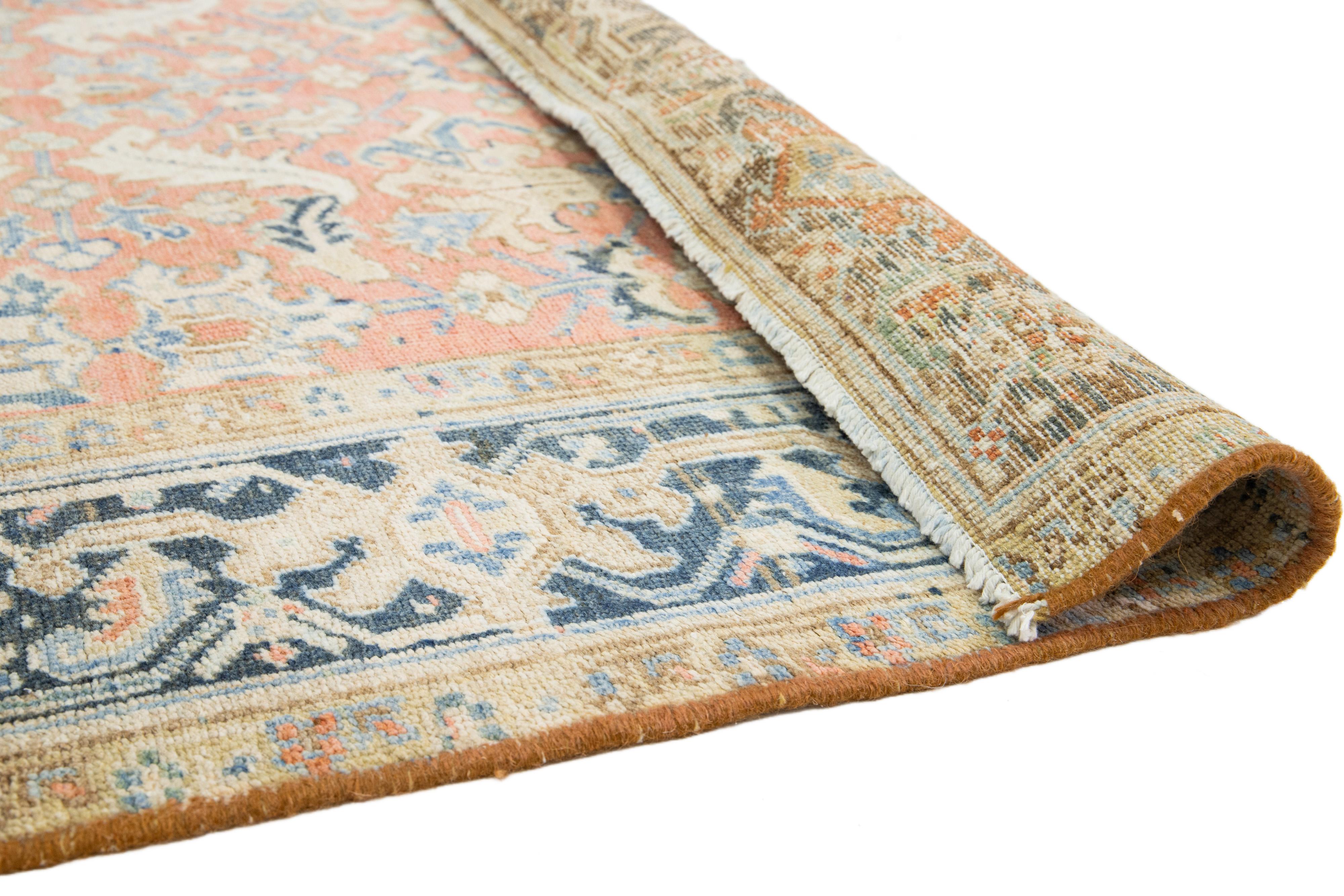 Heriz Serapi Antique Hand-knotted Persian Heriz Wool Rug In Peach With Allover Motif For Sale