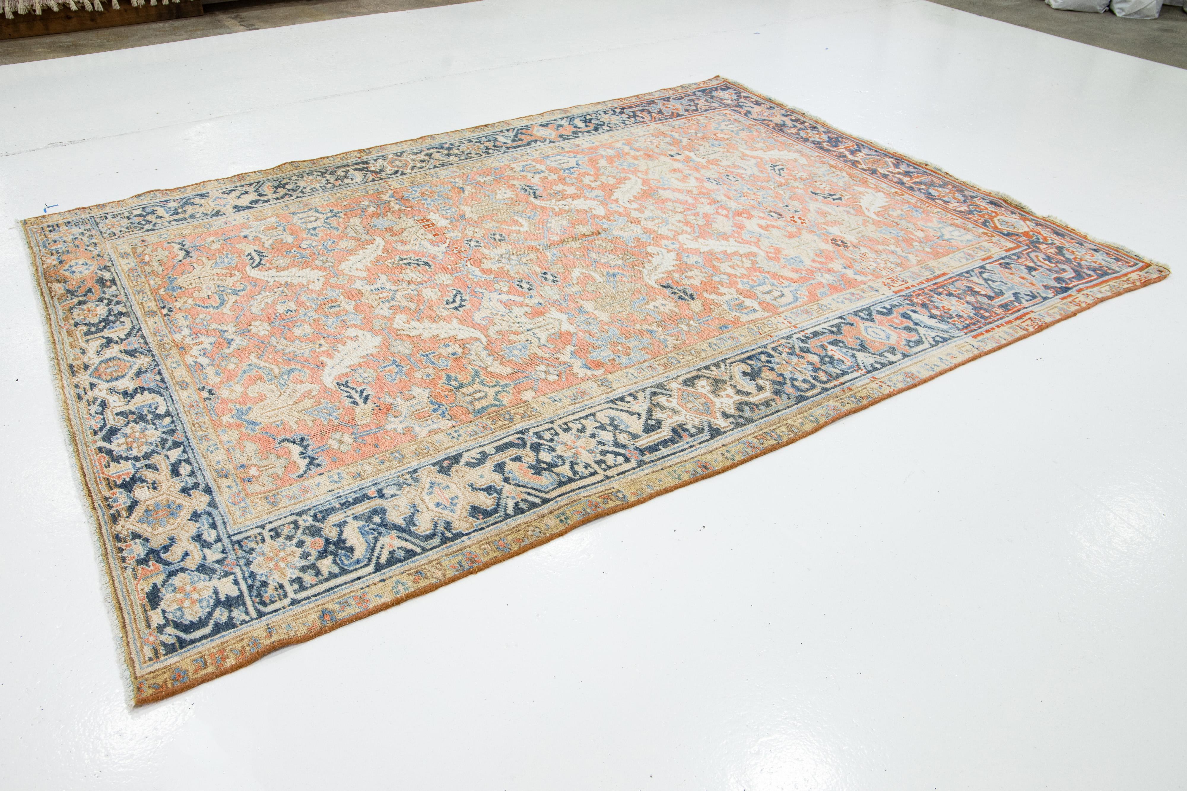 Hand-Knotted Antique Hand-knotted Persian Heriz Wool Rug In Peach With Allover Motif For Sale