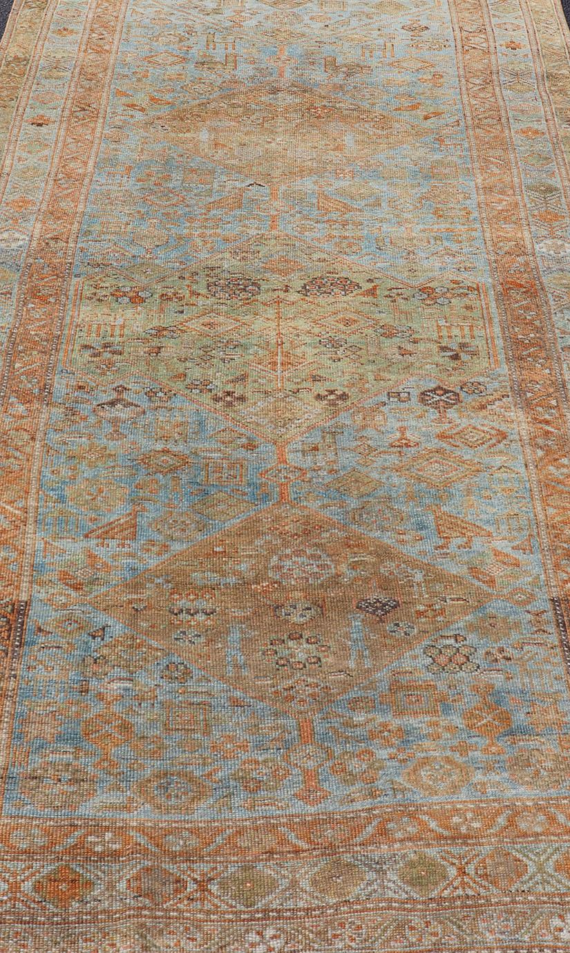 20th Century Antique Hand Knotted Persian Kurdish Rug in Blue, Green and Soft Red For Sale