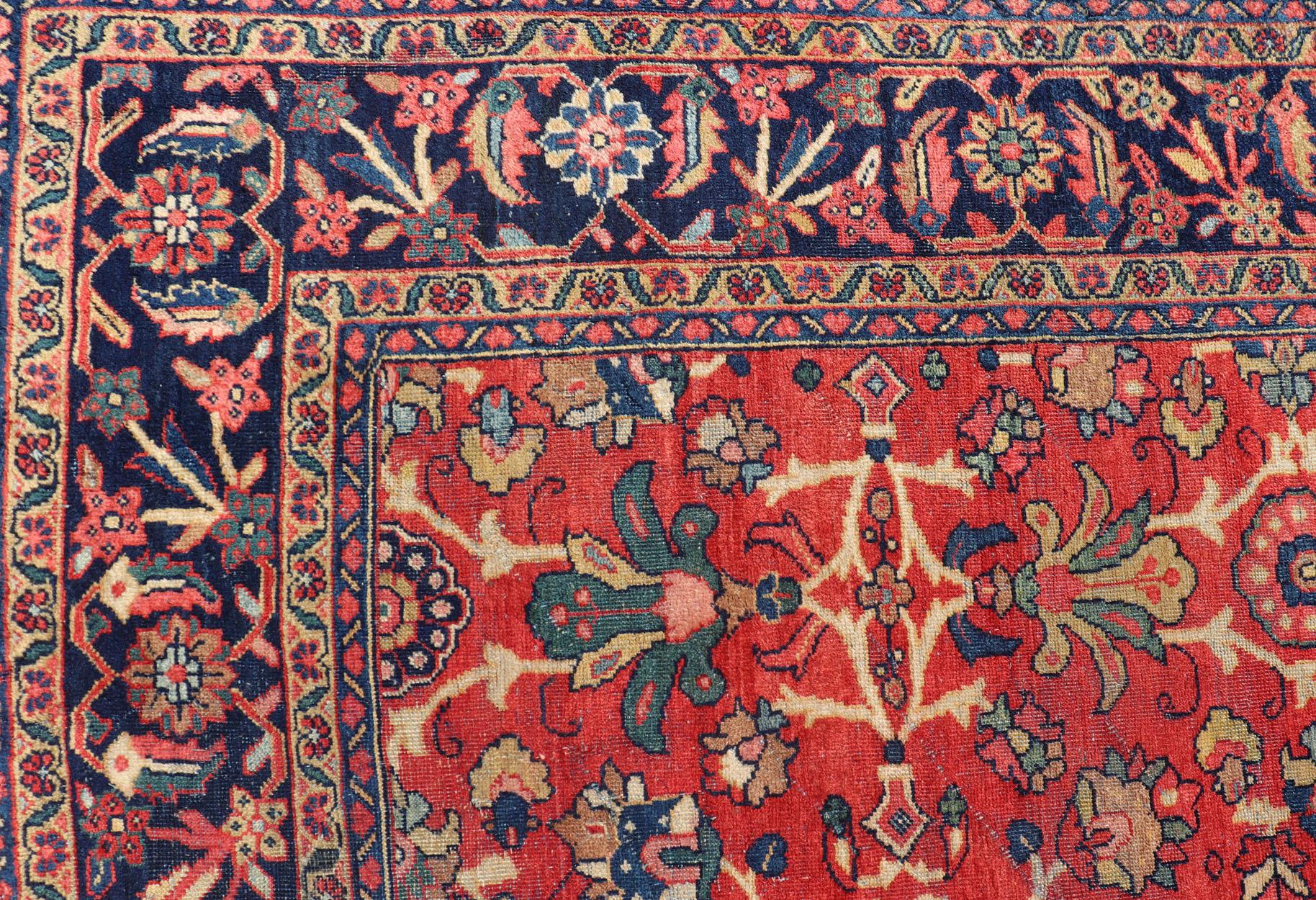 This antique hand-knotted Persian Mahal rug features an all-over sub-geometric floral design set upon a on red field. The entirety of this piece is enclosed within a complementary multi-tiered border.

Antique Persian Mahal, Keivan Woven Arts /