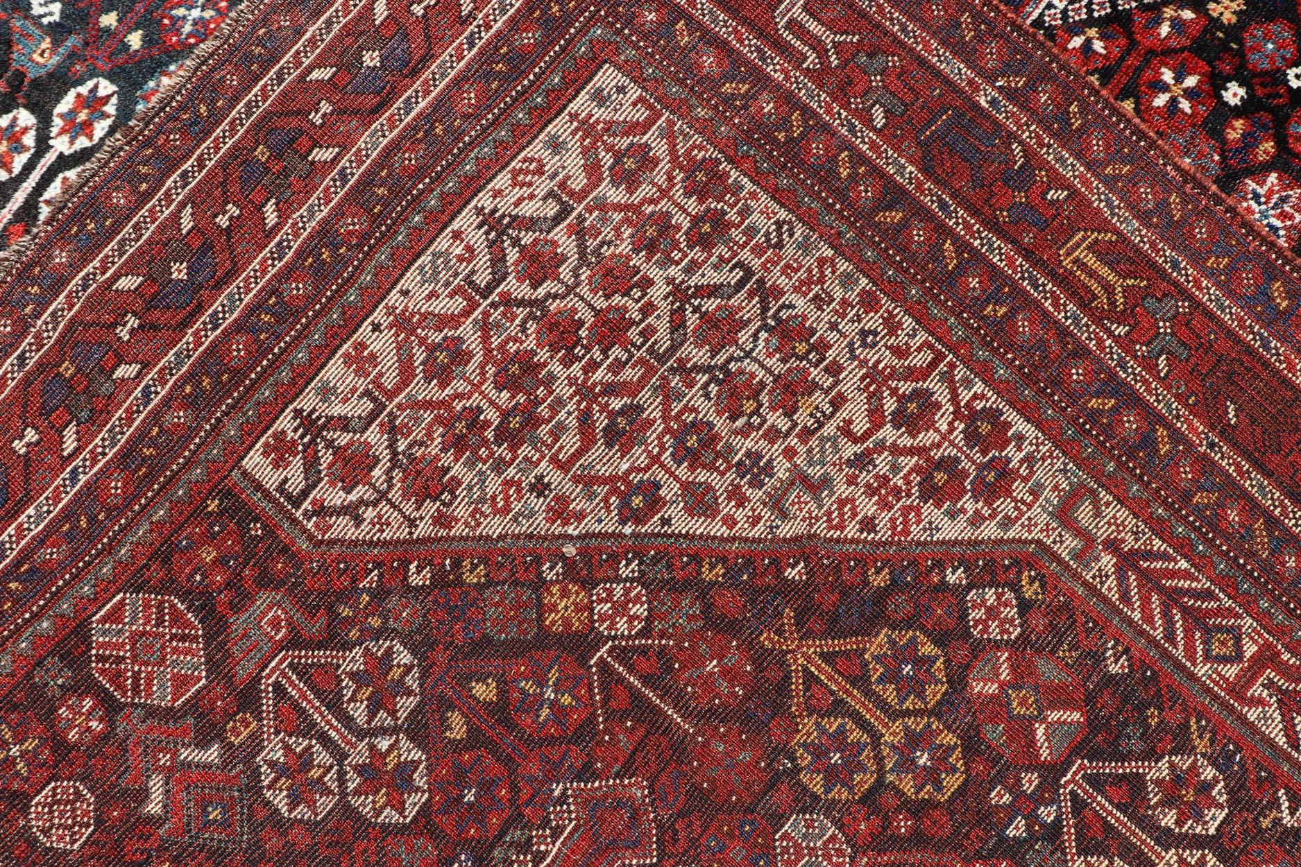 Antique Hand-Knotted Persian Qashqai Rug in Wool with All-Over Tribal Design For Sale 9