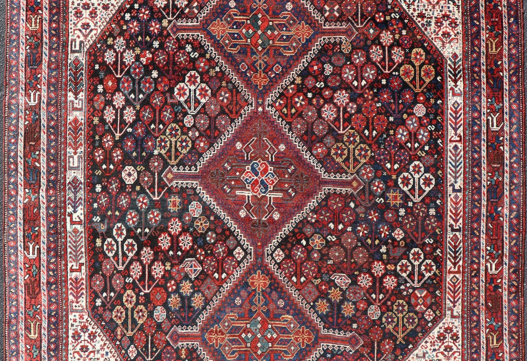 Antique Hand-Knotted Persian Qashqai Rug in Wool with All-Over Tribal Design For Sale 4