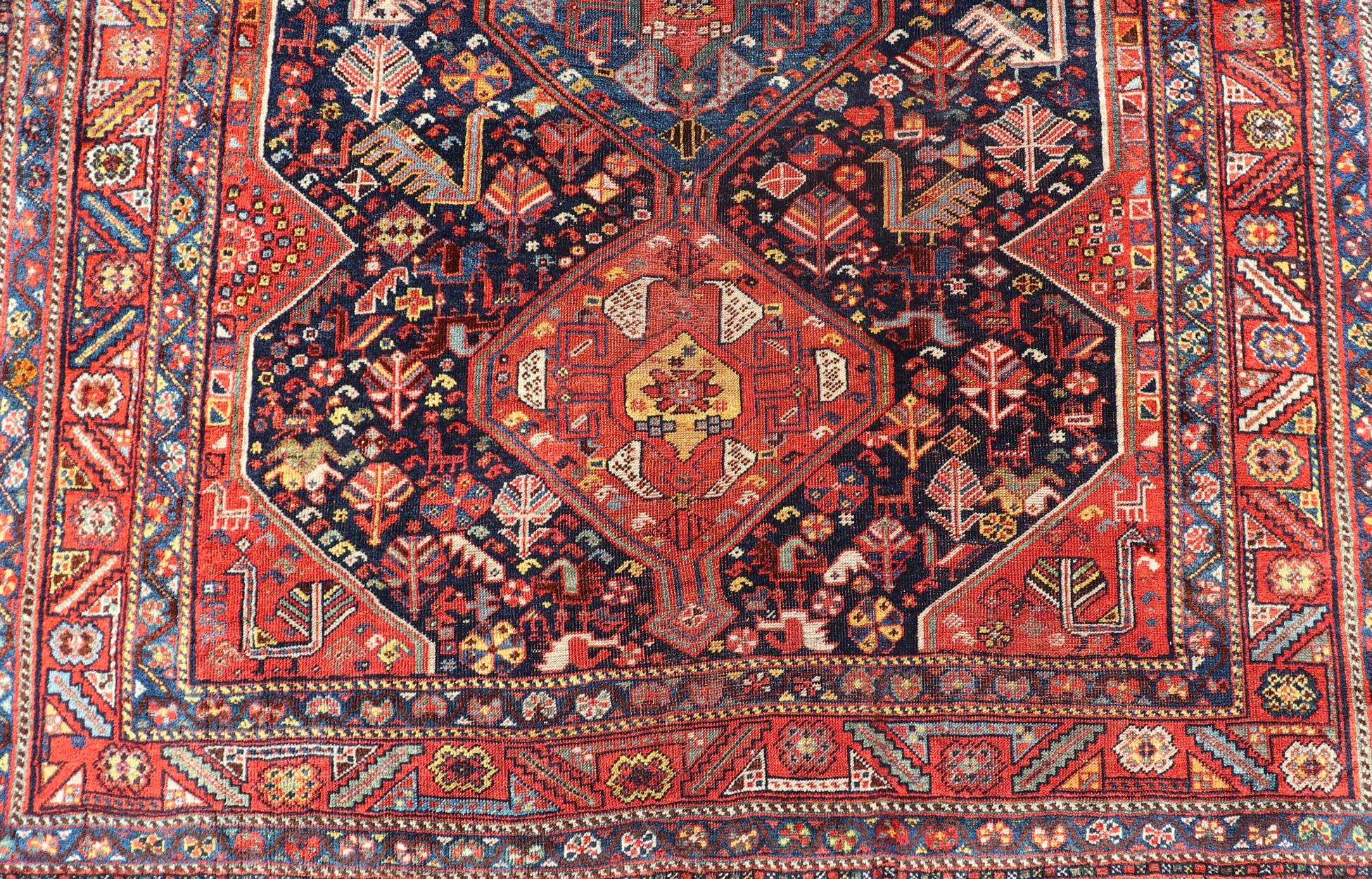 Hand-Knotted Antique Hand Knotted Persian Qashqai Shiraz Tribal Rug with Tribal Design For Sale