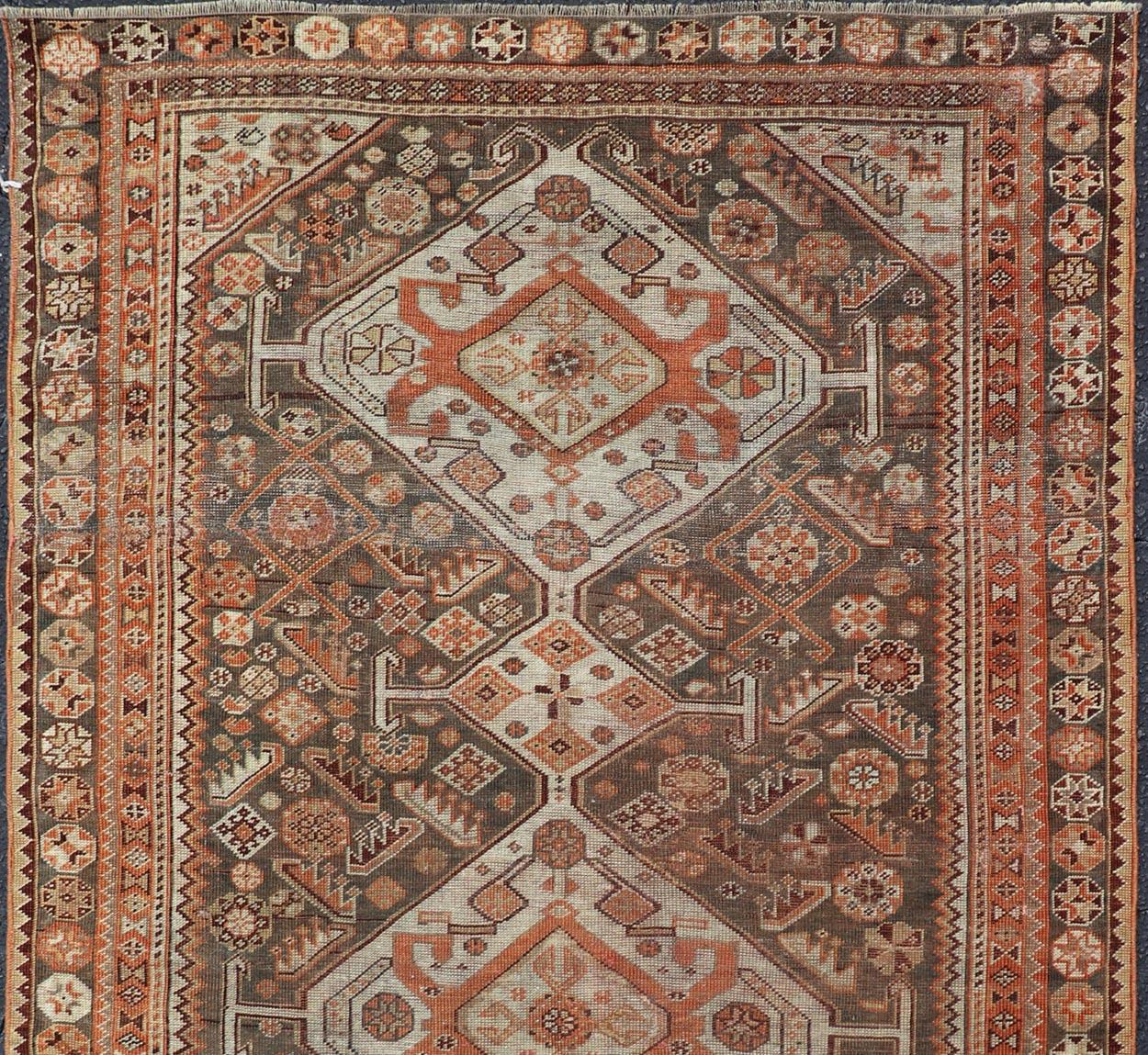 Antique Hand-Knotted Persian Shiraz in Wool with All-Over Medallion Design In Good Condition For Sale In Atlanta, GA