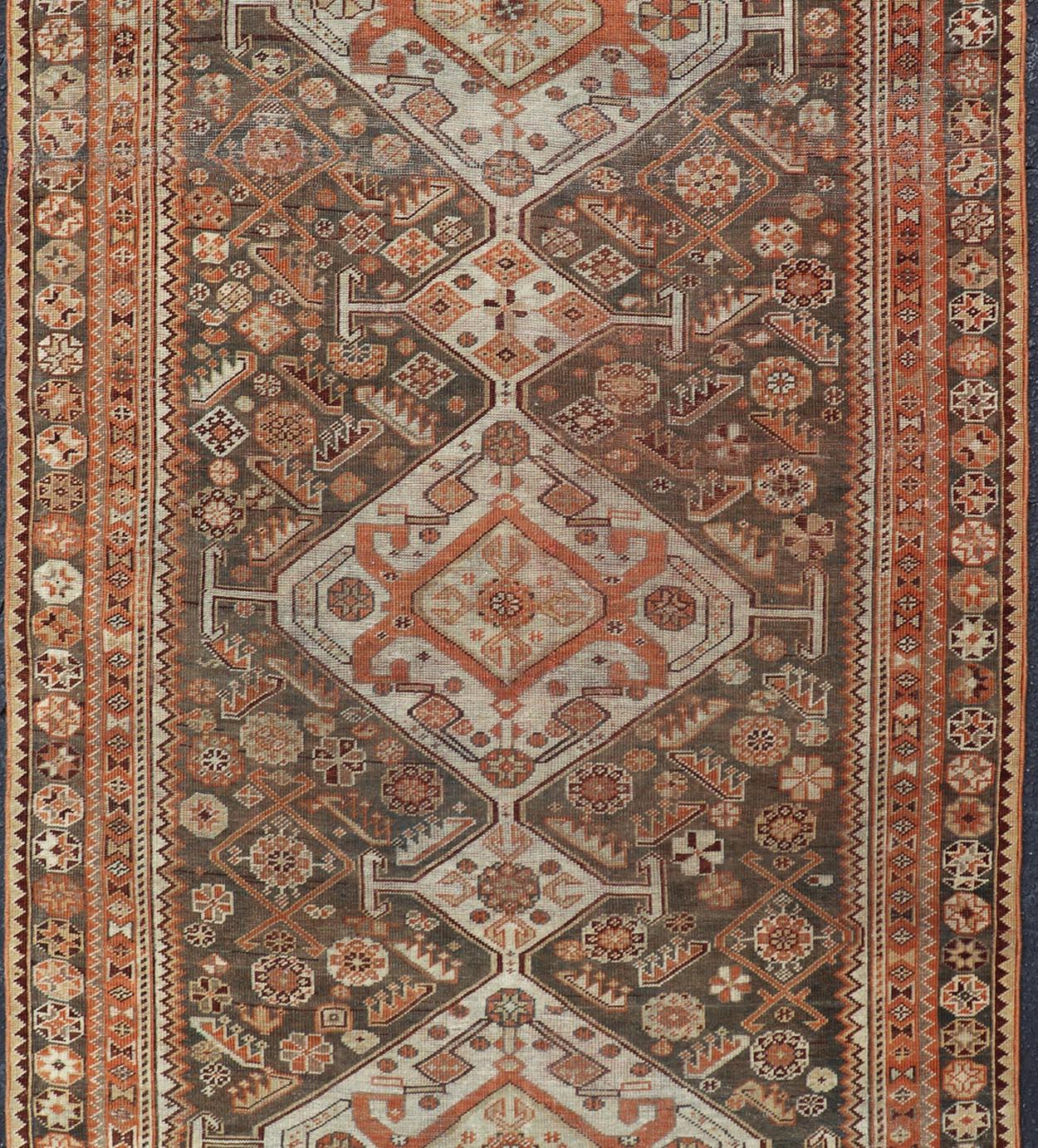 20th Century Antique Hand-Knotted Persian Shiraz in Wool with All-Over Medallion Design For Sale