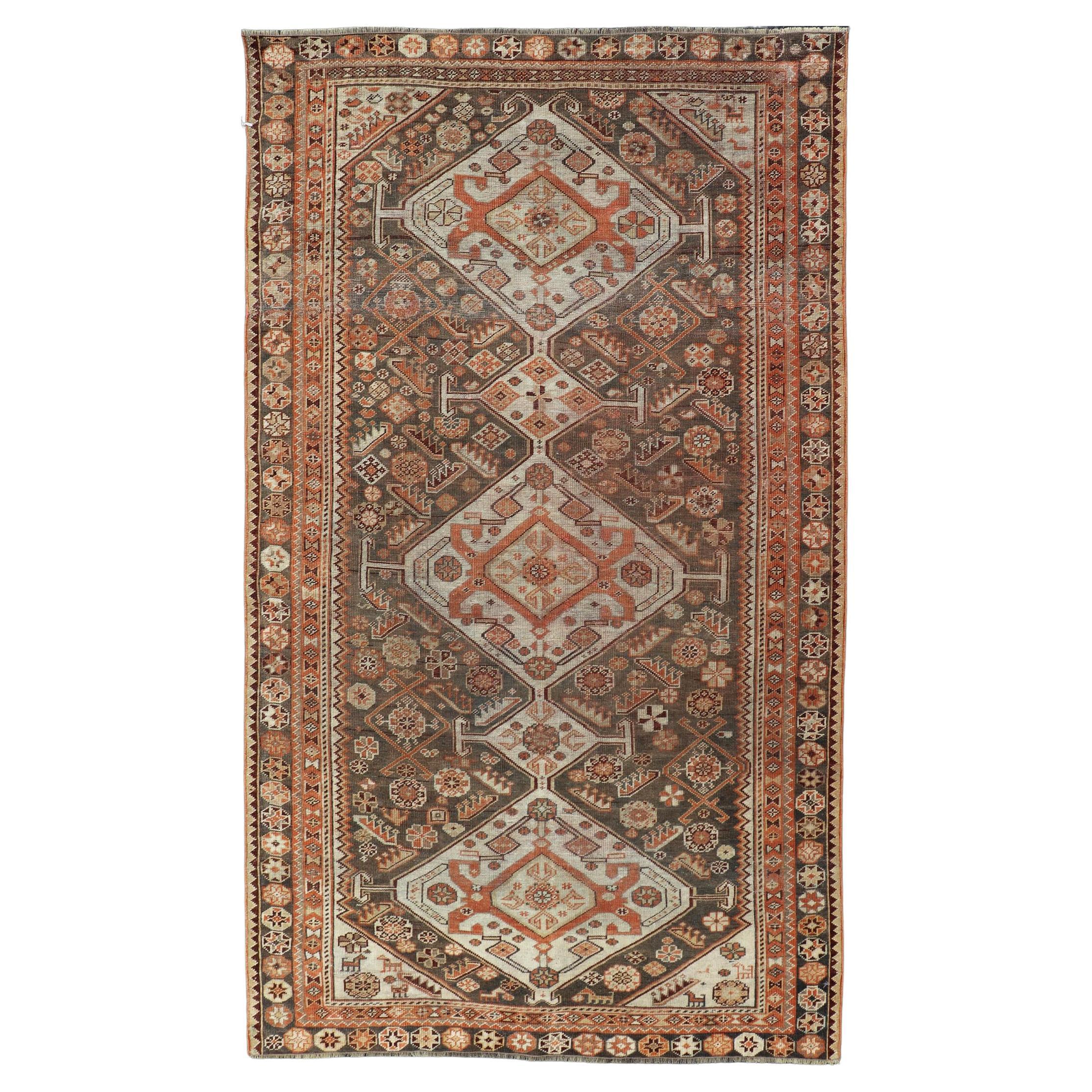 Antique Hand-Knotted Persian Shiraz in Wool with All-Over Medallion Design For Sale