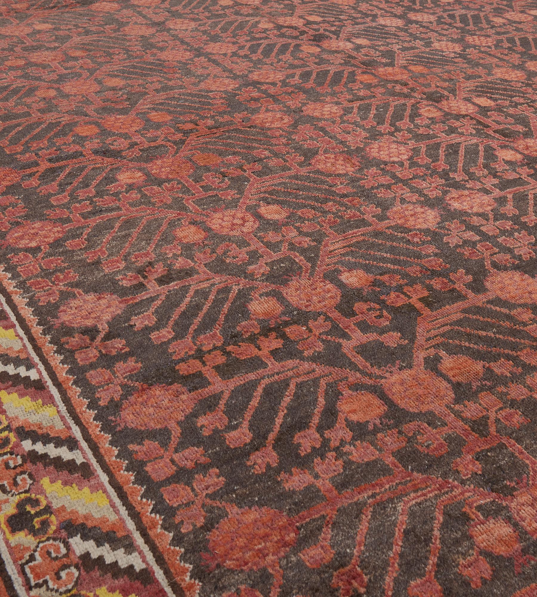 20th Century Antique Hand-Knotted Red Pomegranate Khotan Rug For Sale
