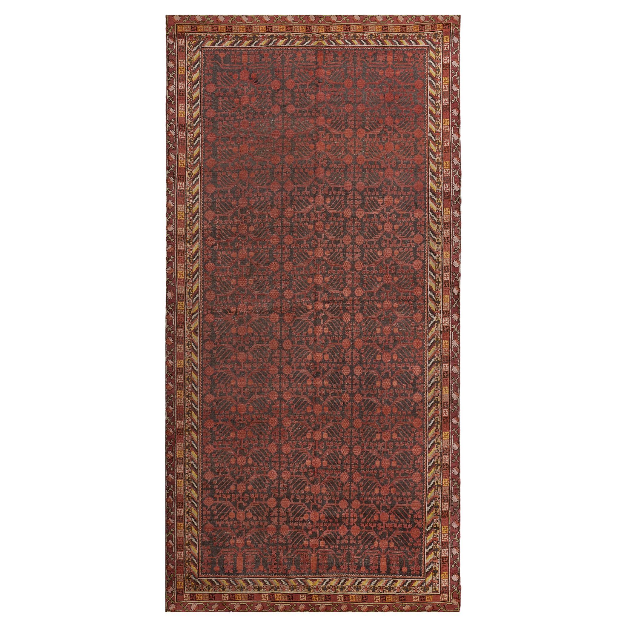 Antique Hand-Knotted Red Pomegranate Khotan Rug