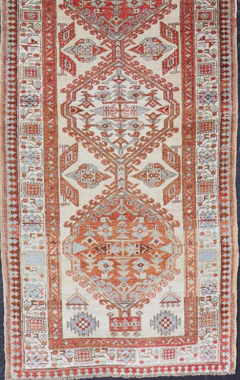 Tribal Antique Hand-Knotted Sarab Runner with Sub-Geometric Design in Red, Blue & Ivory For Sale