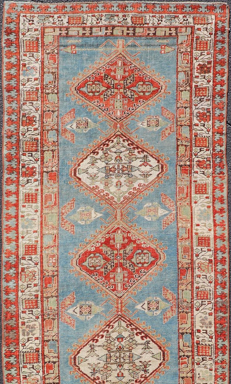 20th Century Antique Hand-Knotted Sarab Runner with Sub-Geometric Design in Red, Blue & Ivory For Sale