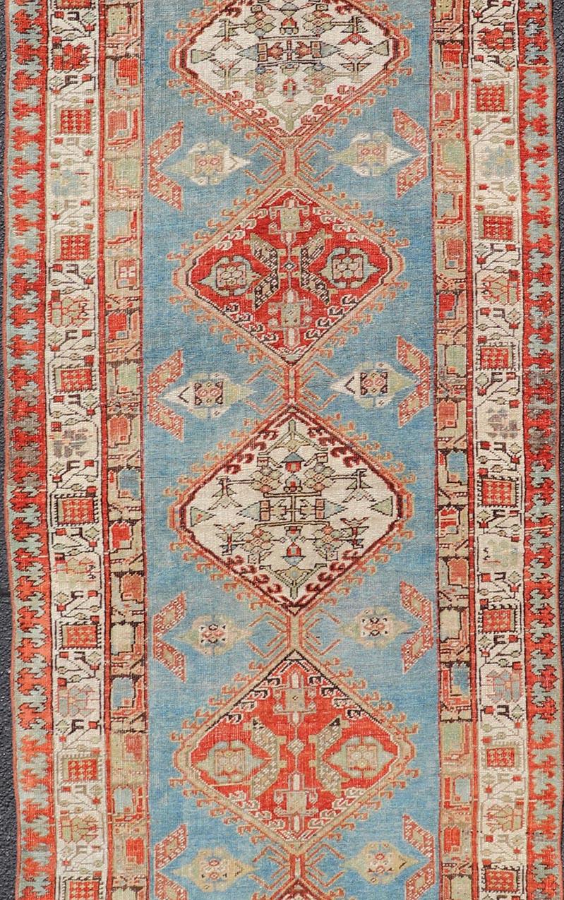 Wool Antique Hand-Knotted Sarab Runner with Sub-Geometric Design in Red, Blue & Ivory For Sale