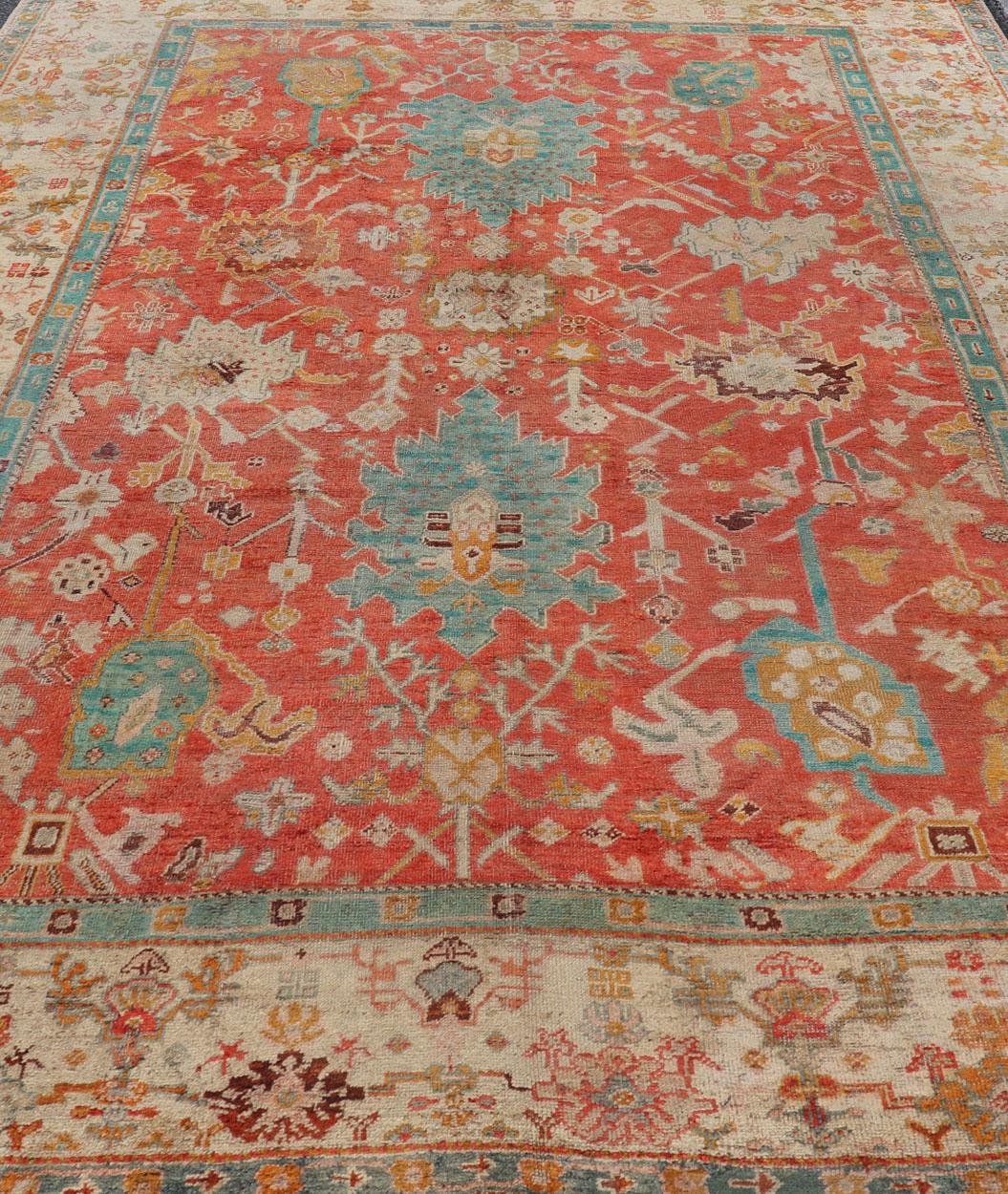 Antique Turkish Oushak In Tribal Motifs in Soft Coral, Blue, Marigold, and Cream For Sale 7