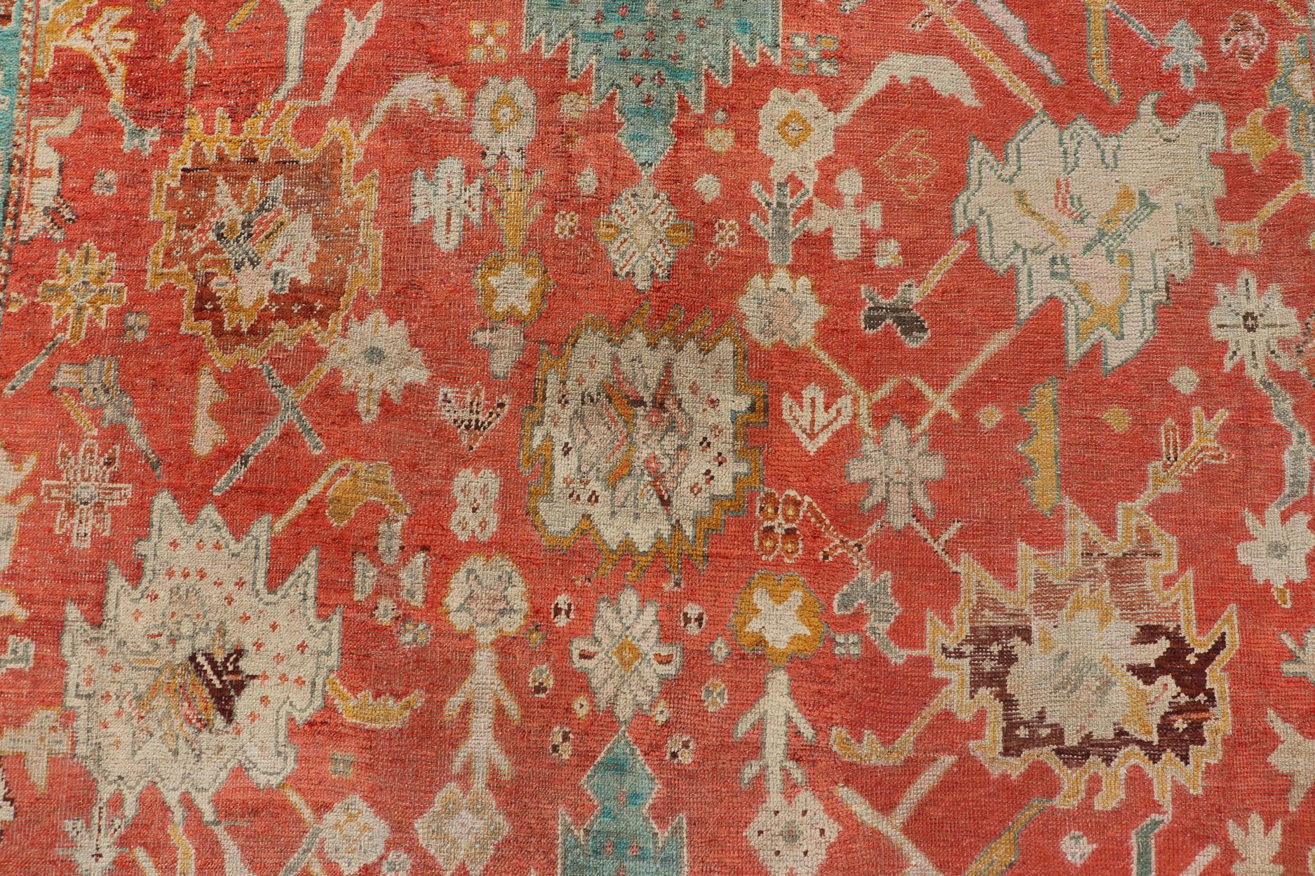 Antique Turkish Oushak In Tribal Motifs in Soft Coral, Blue, Marigold, and Cream For Sale 9