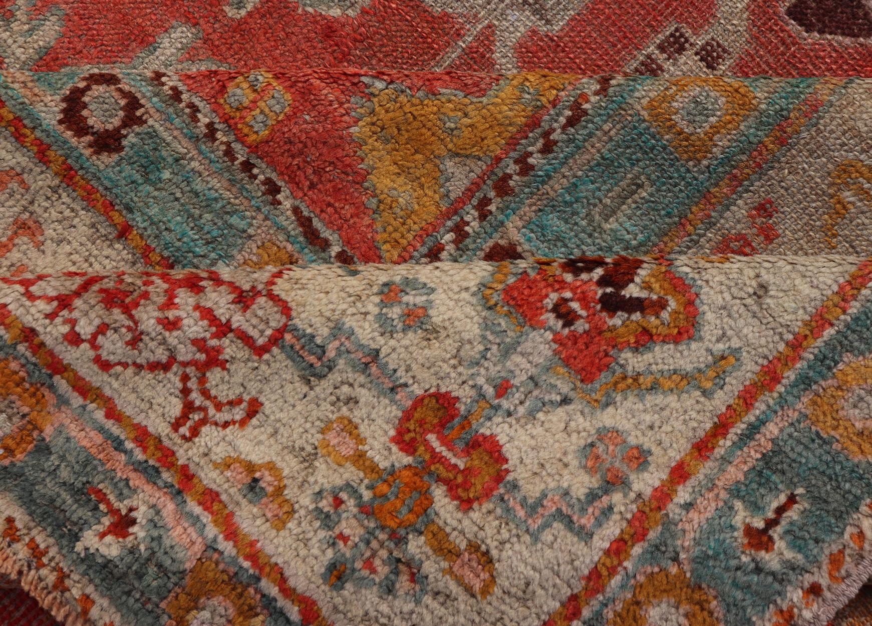 Antique Turkish Oushak In Tribal Motifs in Soft Coral, Blue, Marigold, and Cream For Sale 10