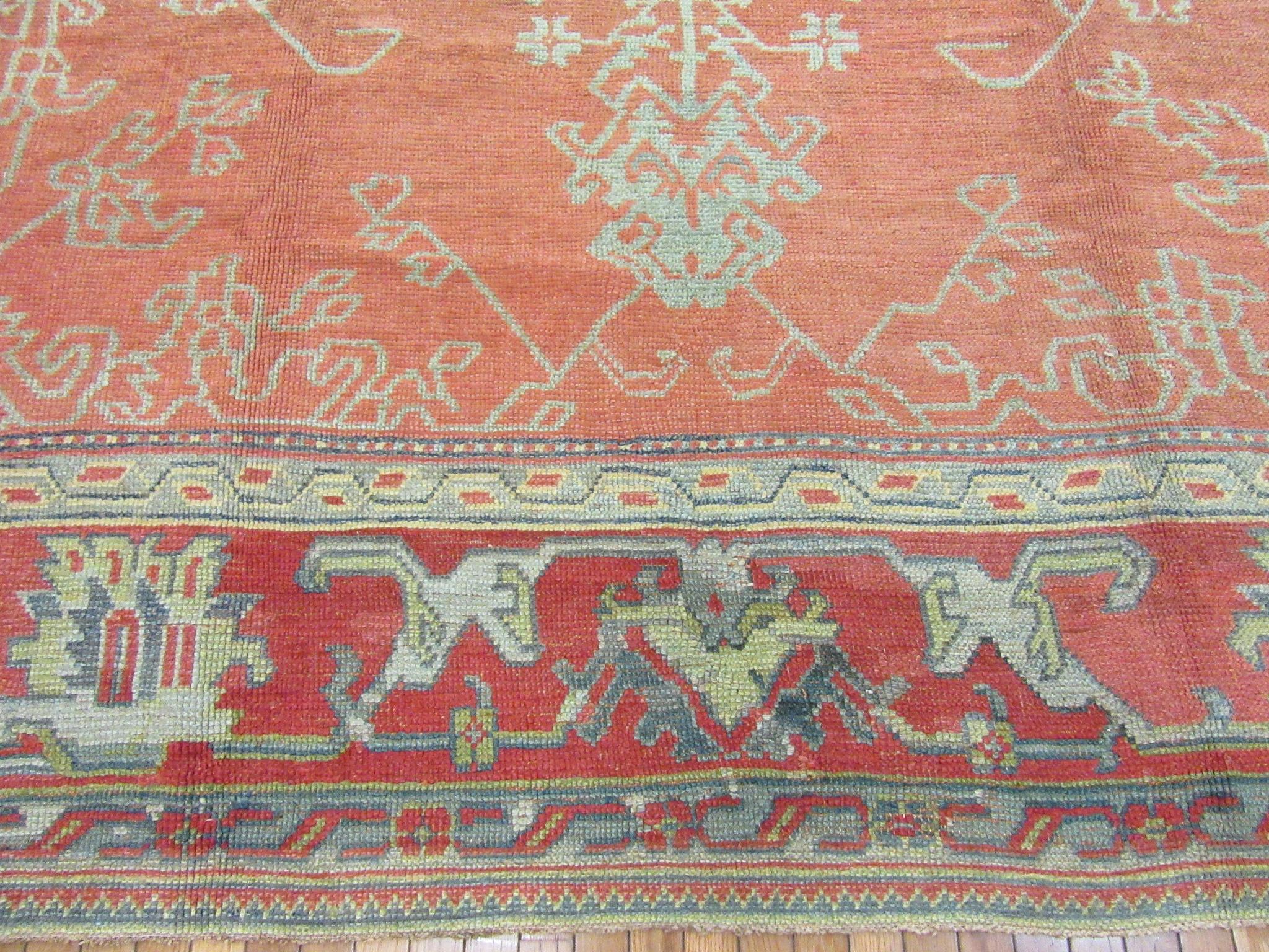20th Century Large Antique Hand-Knotted Wool Coral Red Green Turkish Oushak Rug For Sale