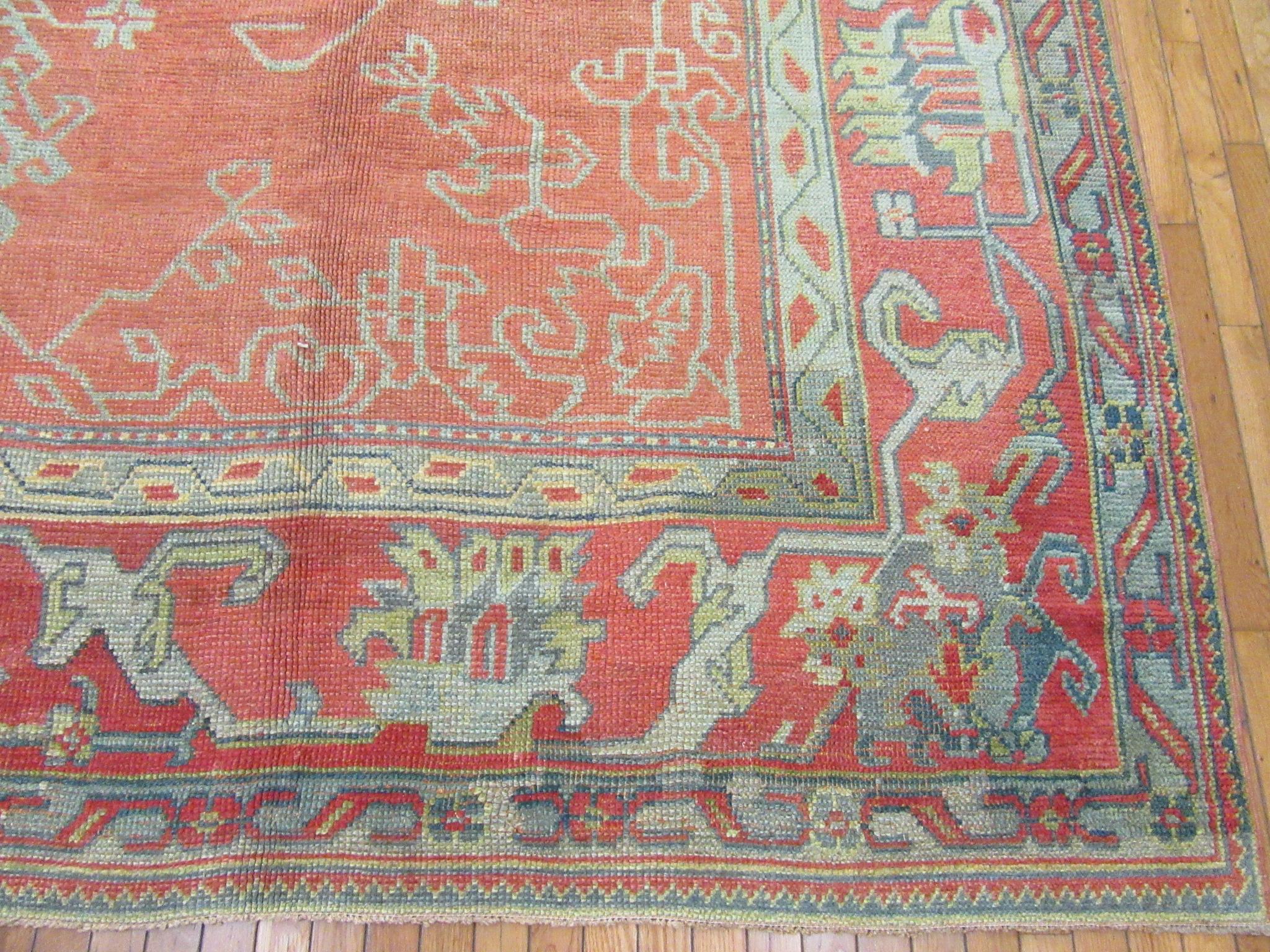 Large Antique Hand-Knotted Wool Coral Red Green Turkish Oushak Rug For Sale 1
