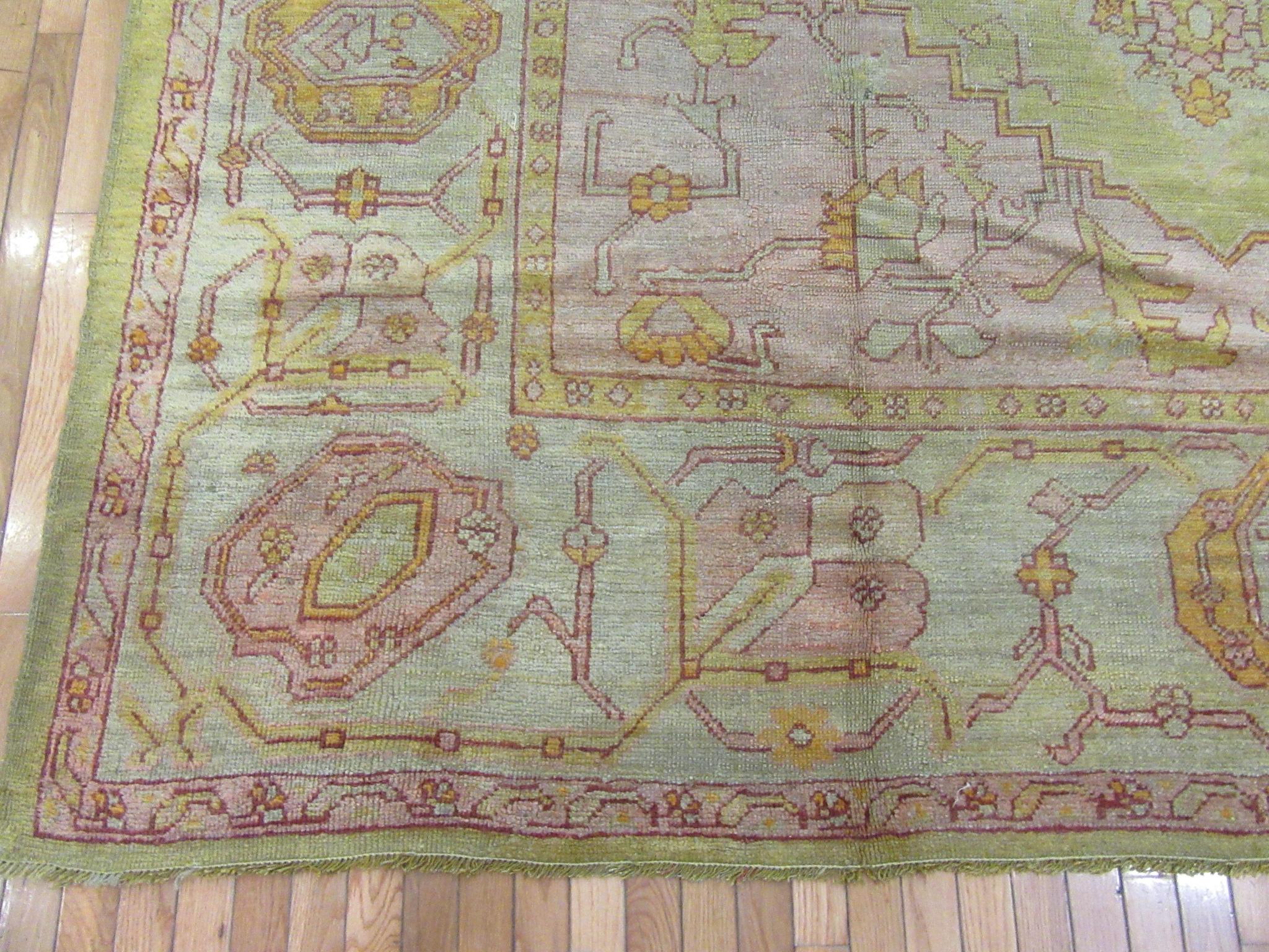 Antique Hand-Knotted Green Color Wool Turkish Oushak Rug In Good Condition For Sale In Atlanta, GA