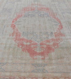 Antique Hand Knotted Turkish Oushak with Large Medallion in Off White and Coral