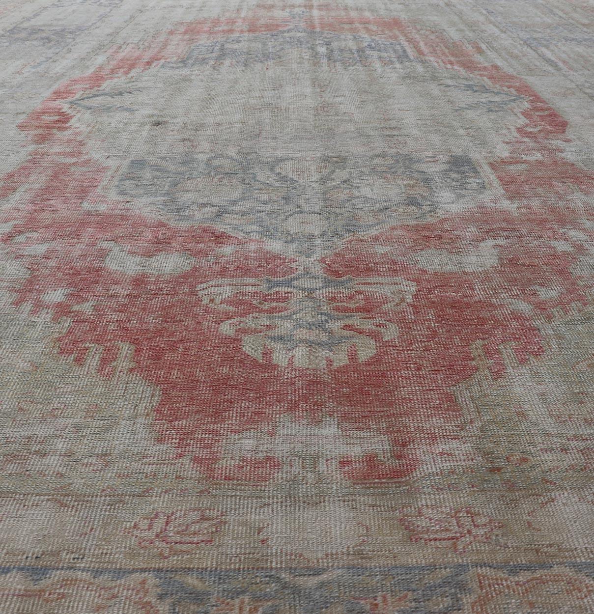 Hand-Knotted Antique Hand Knotted Turkish Oushak with Large Medallion in Off White and Coral For Sale