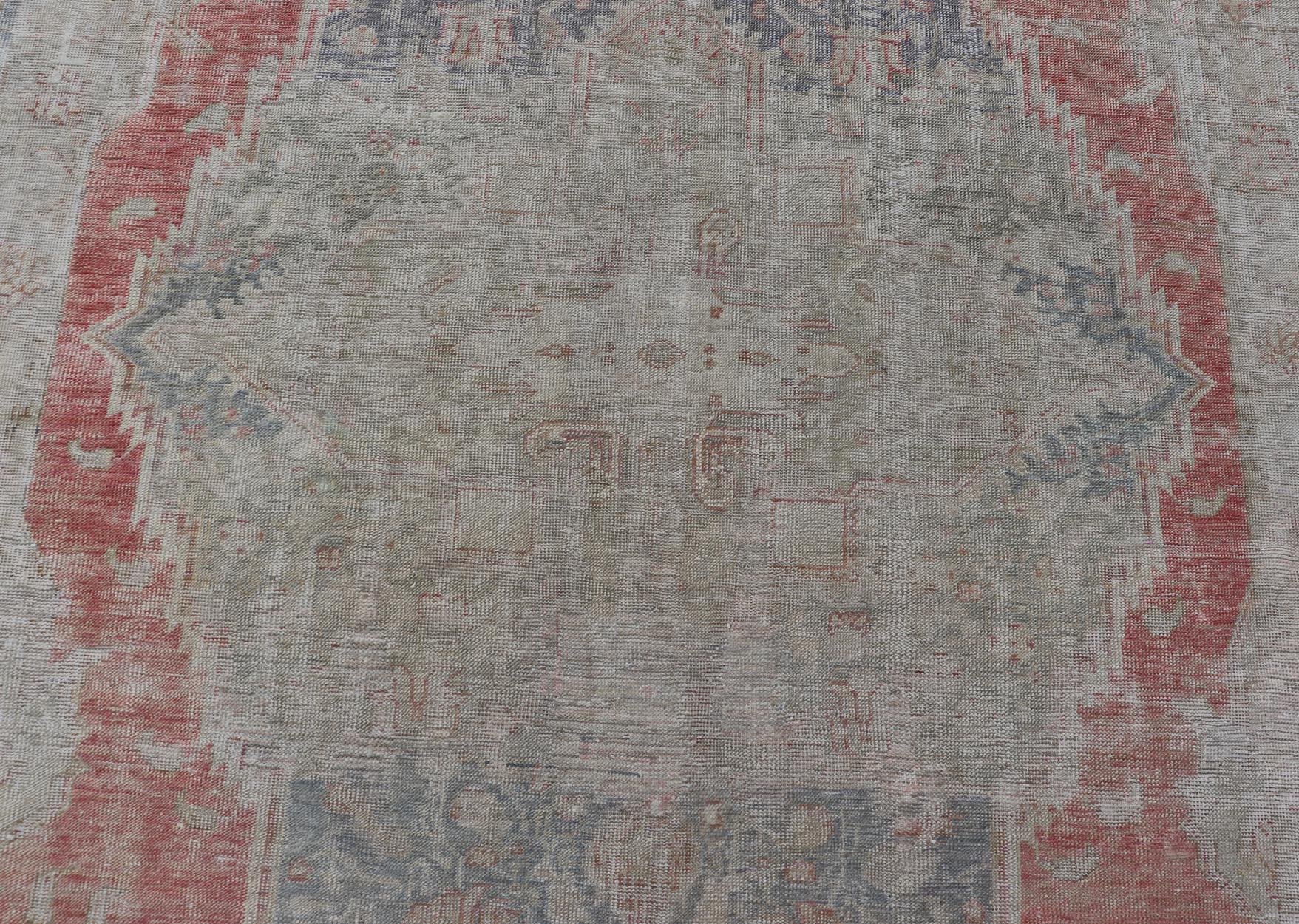 Antique Hand Knotted Turkish Oushak with Large Medallion in Off White and Coral In Good Condition For Sale In Atlanta, GA