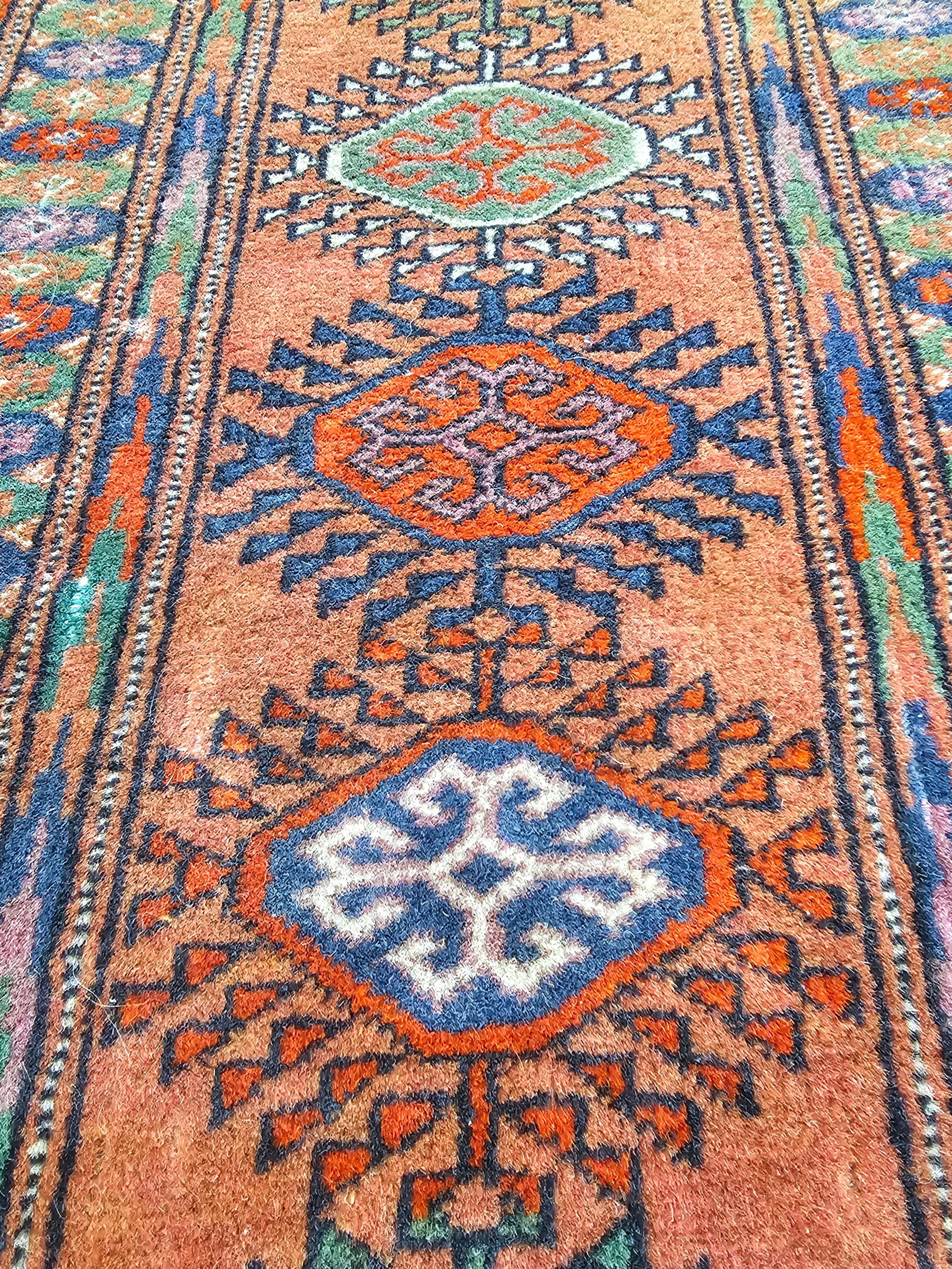 Antique Hand-knotted Turkmen Bokhara Rug in brick orange/red, Turkmenistan 1920s 1