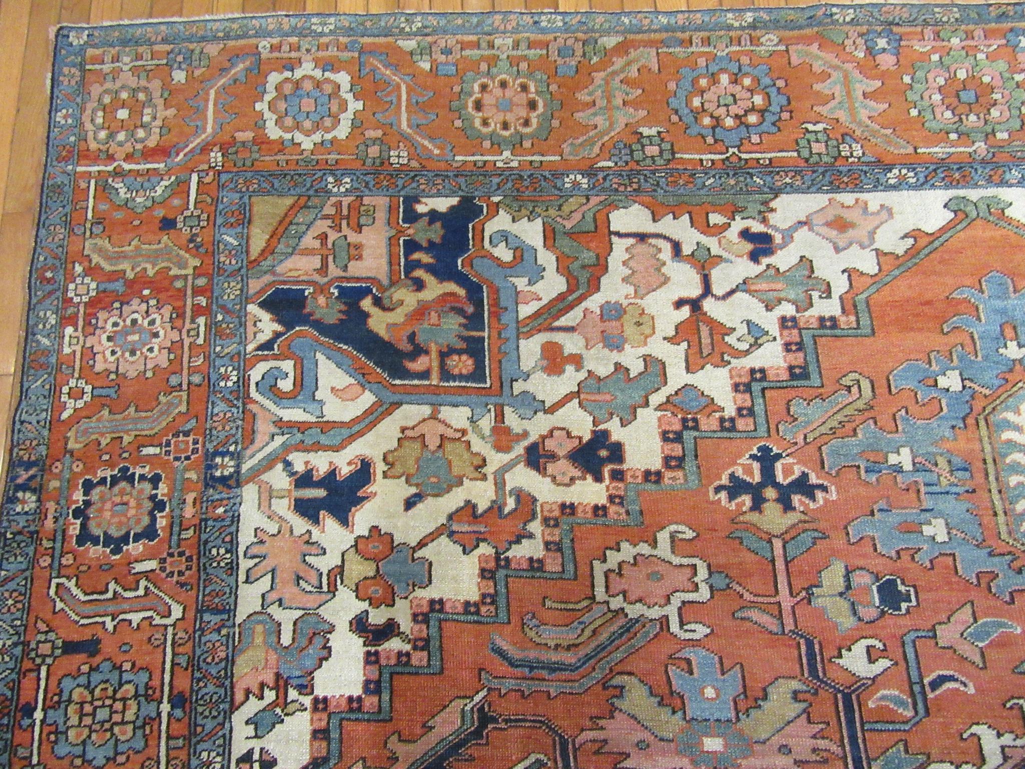 Antique Hand Knotted Wool Red and Blue Persian Serapi Rug For Sale 5