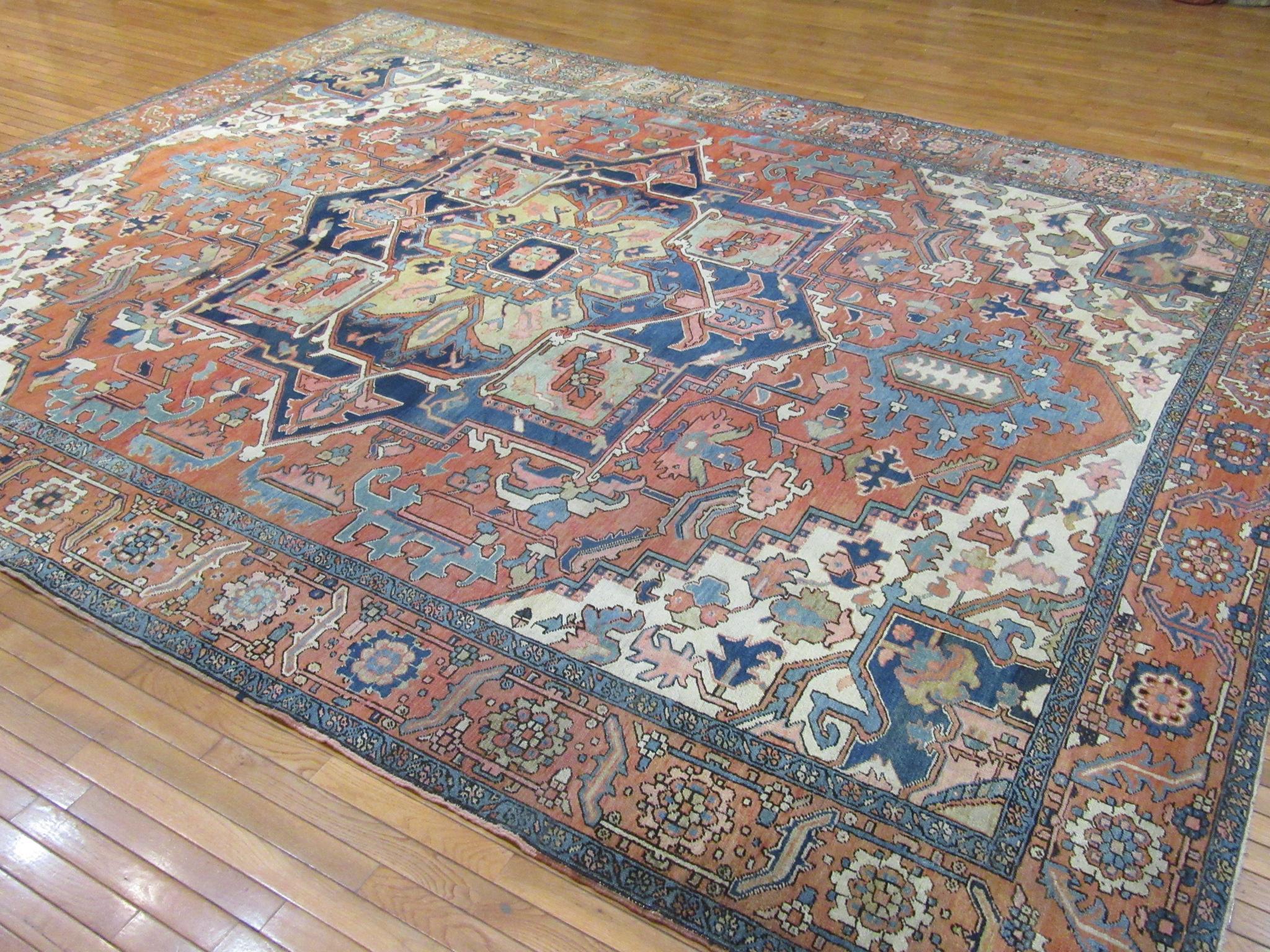 Antique Hand Knotted Wool Red and Blue Persian Serapi Rug For Sale 11