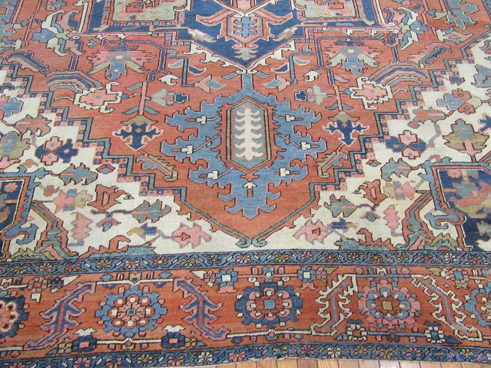 Antique Hand Knotted Wool Red and Blue Persian Serapi Rug In Good Condition For Sale In Atlanta, GA