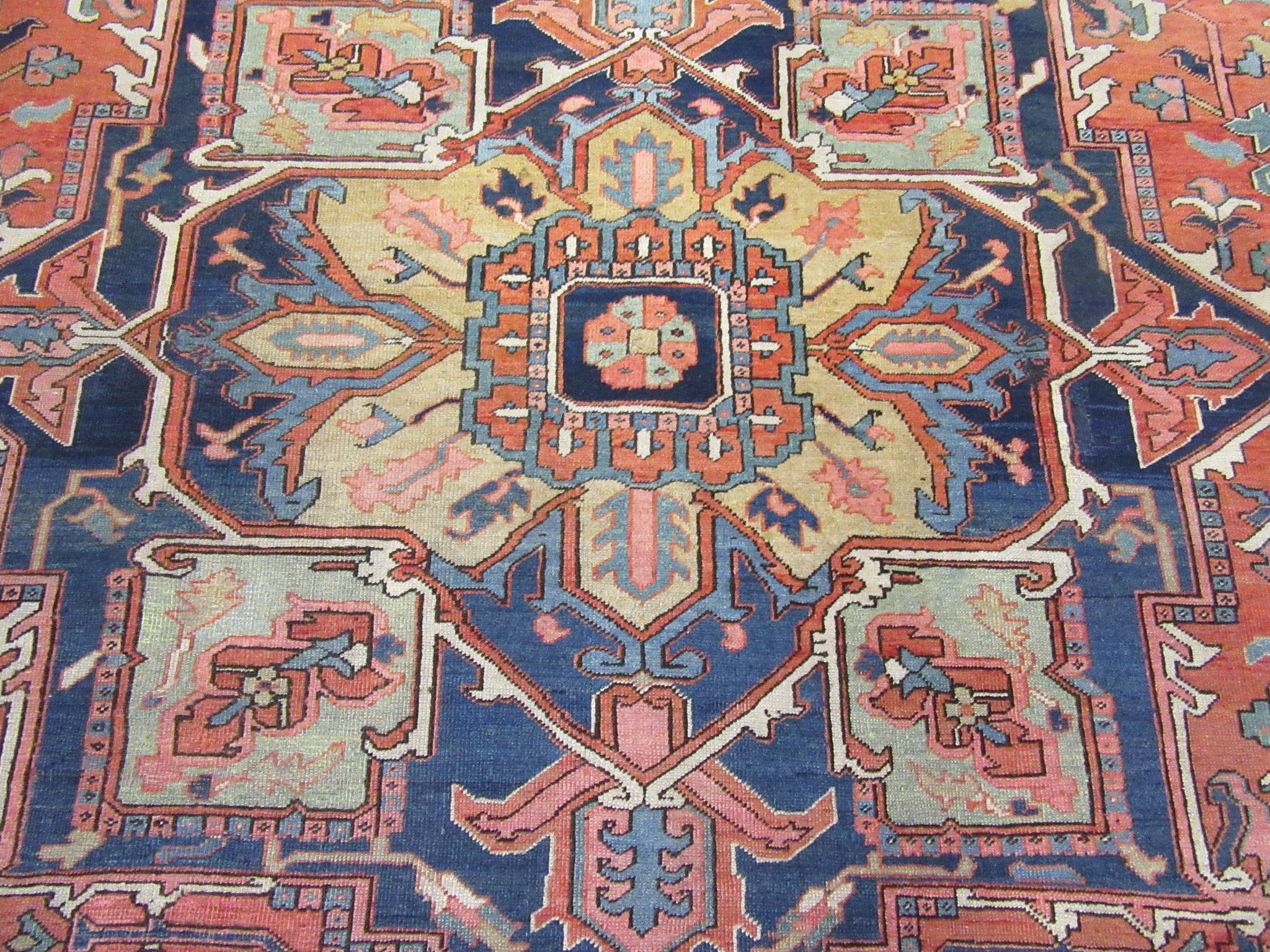 Antique Hand Knotted Wool Red and Blue Persian Serapi Rug For Sale 1