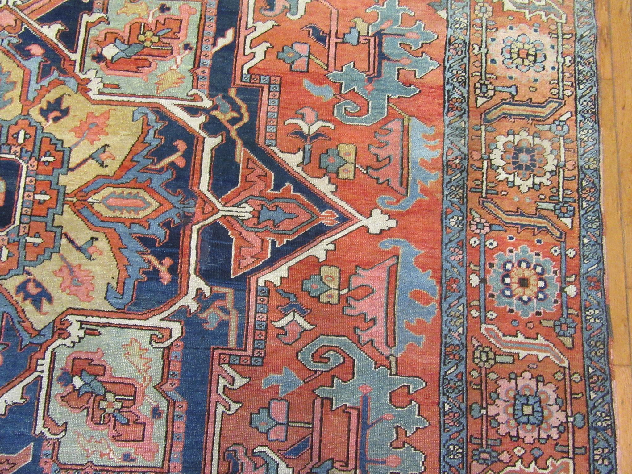 Antique Hand Knotted Wool Red and Blue Persian Serapi Rug For Sale 2