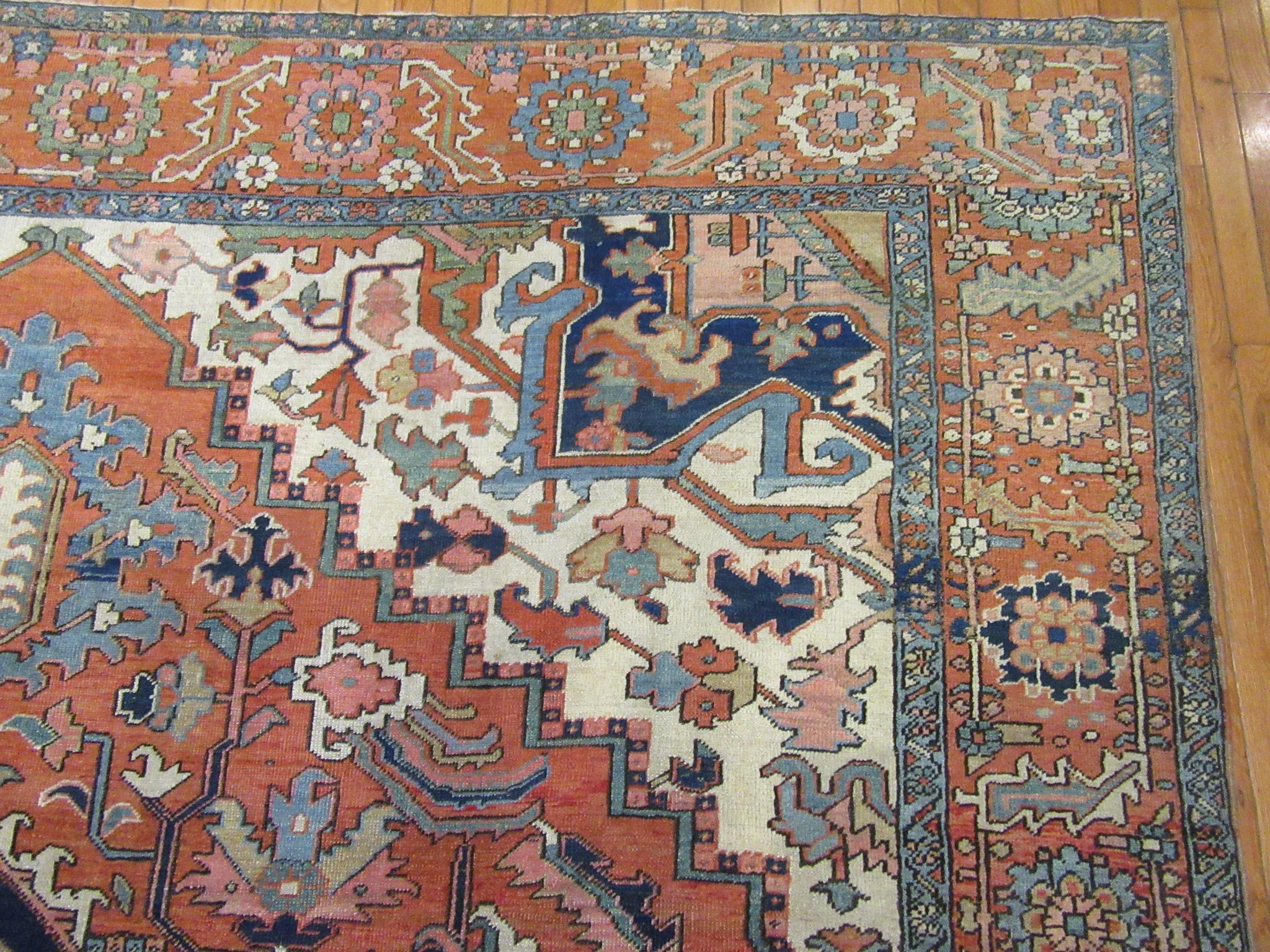 Antique Hand Knotted Wool Red and Blue Persian Serapi Rug For Sale 3