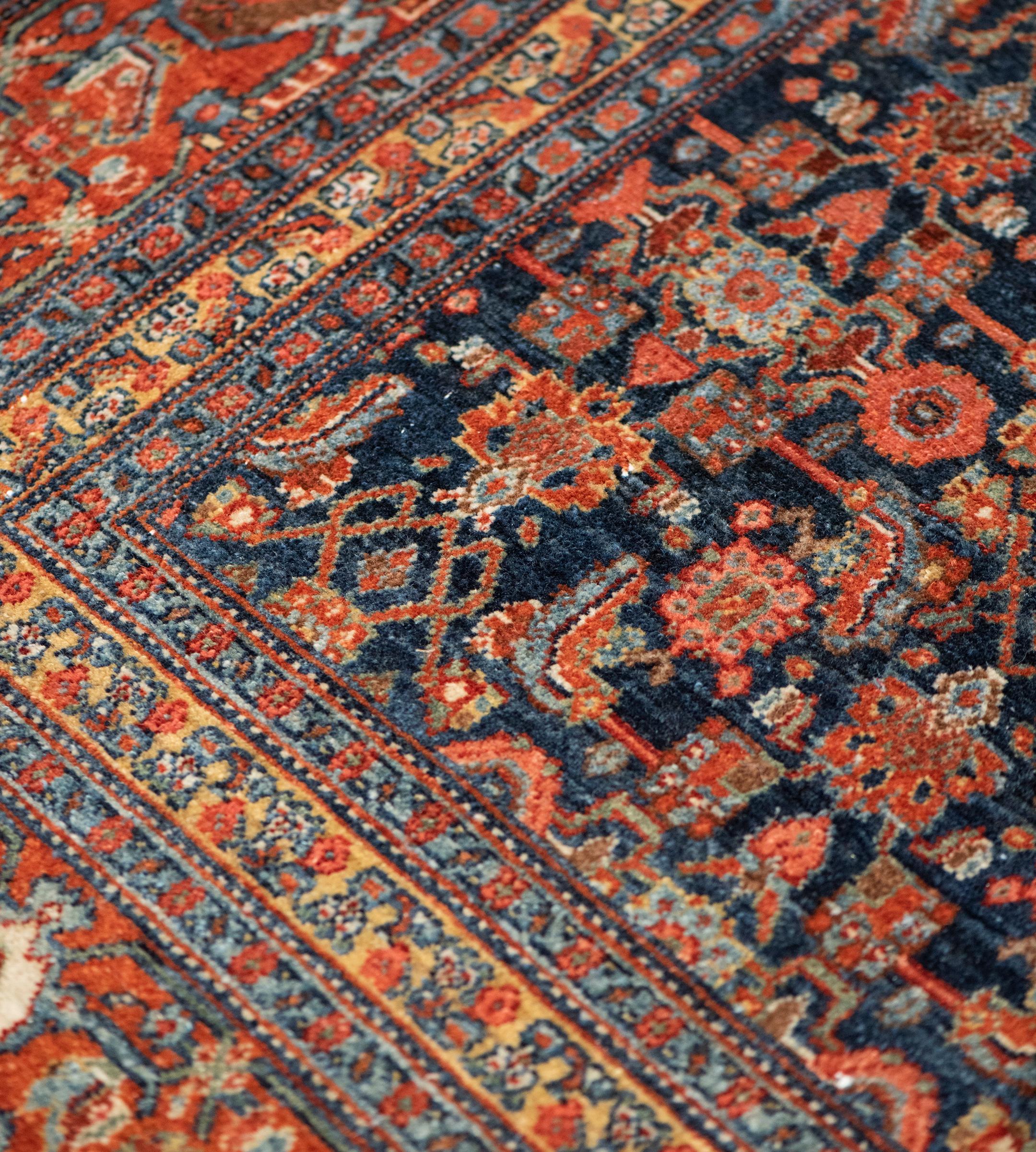 Antiker handgeknüpfter persischer Seneh-Teppich aus Wolle mit Herati-Pattern (Persisch) im Angebot
