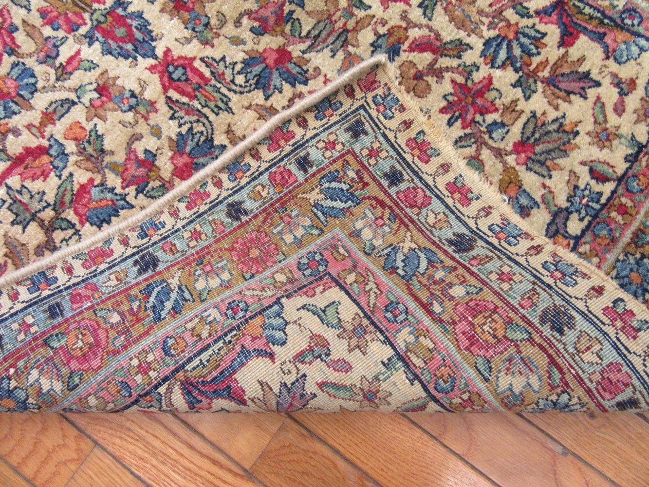 Hand-Knotted Antique Hand Knotted Wool Persian Kerman Runner For Sale