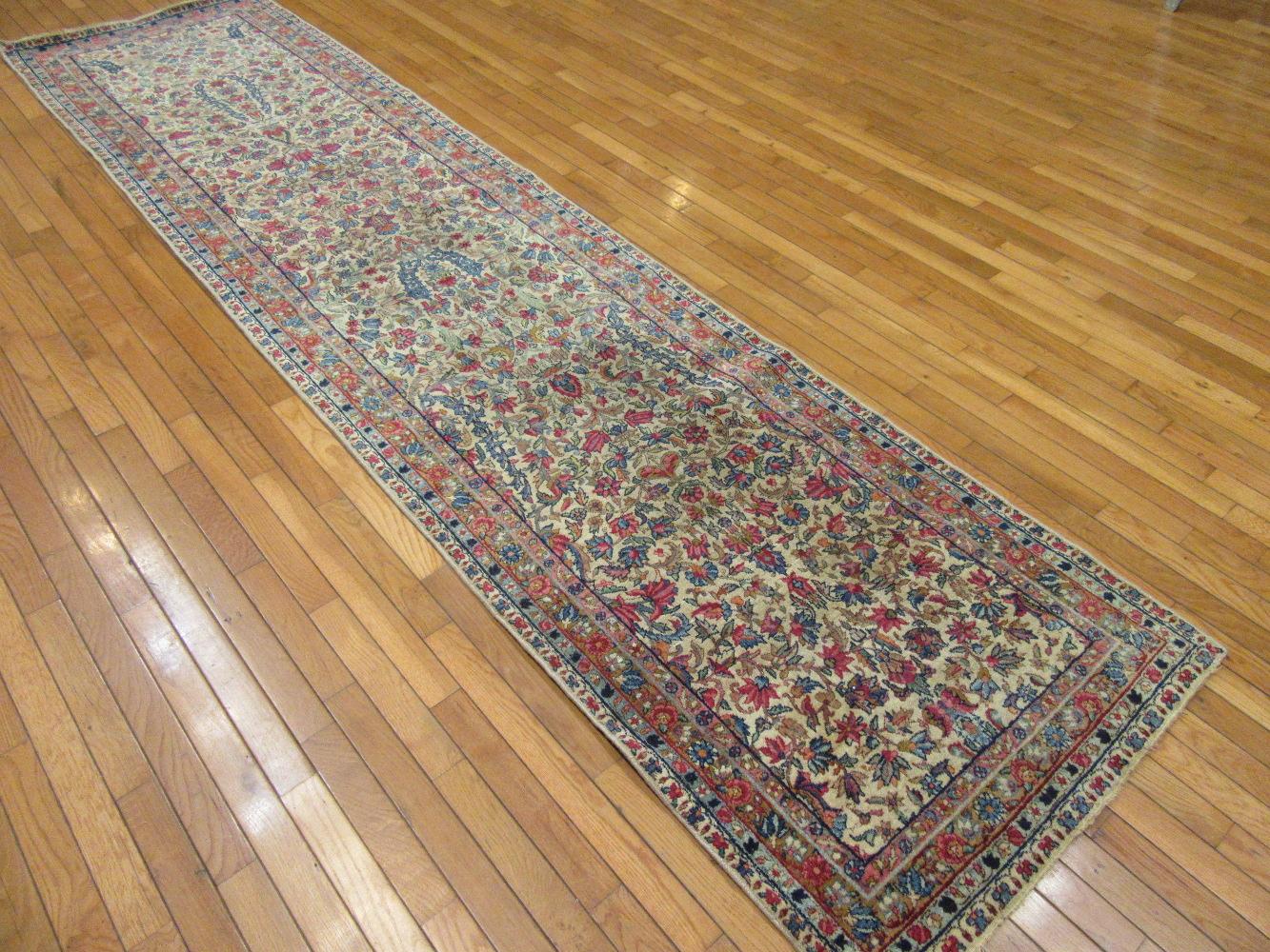 20th Century Antique Hand Knotted Wool Persian Kerman Runner For Sale