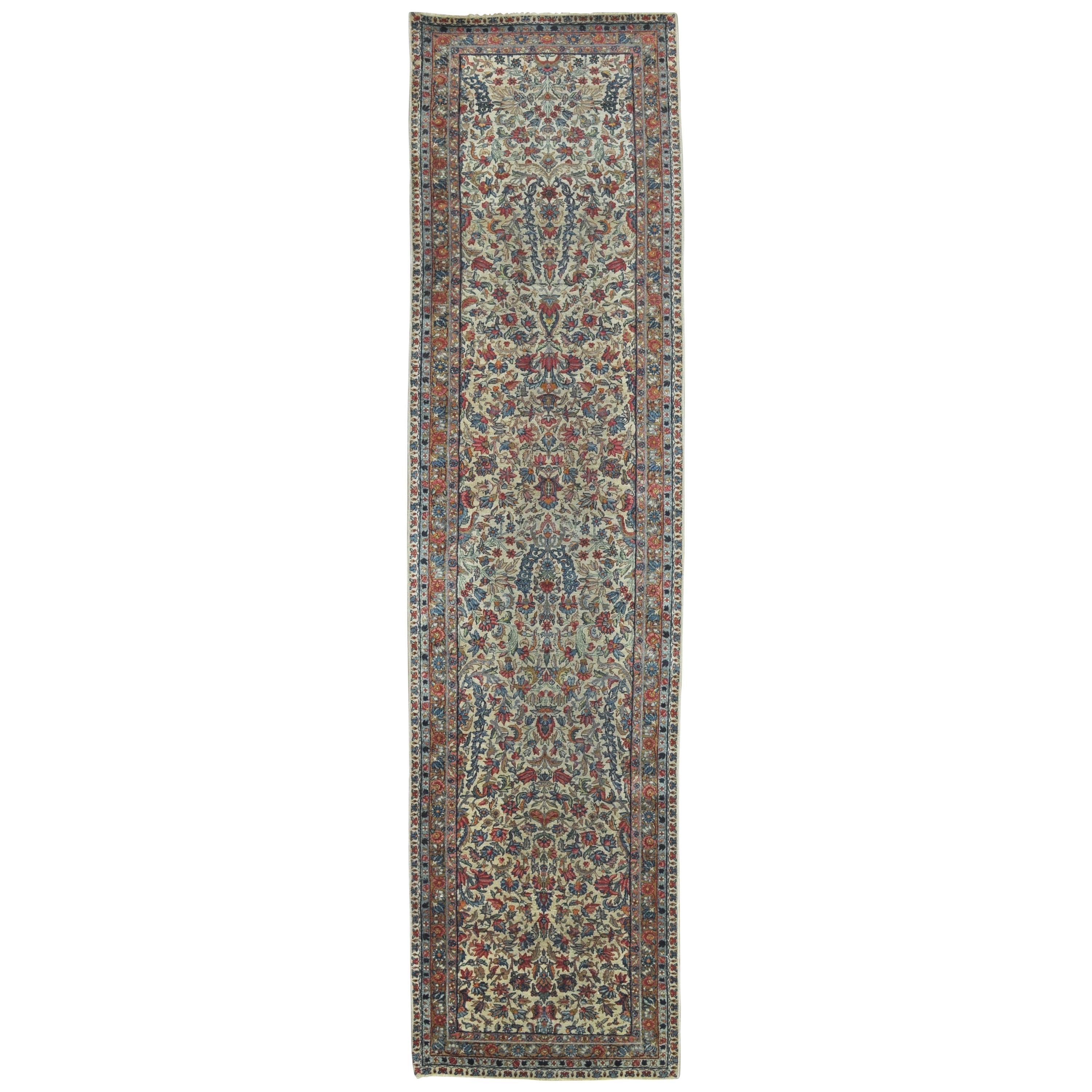 Antique Hand Knotted Wool Persian Kerman Runner For Sale