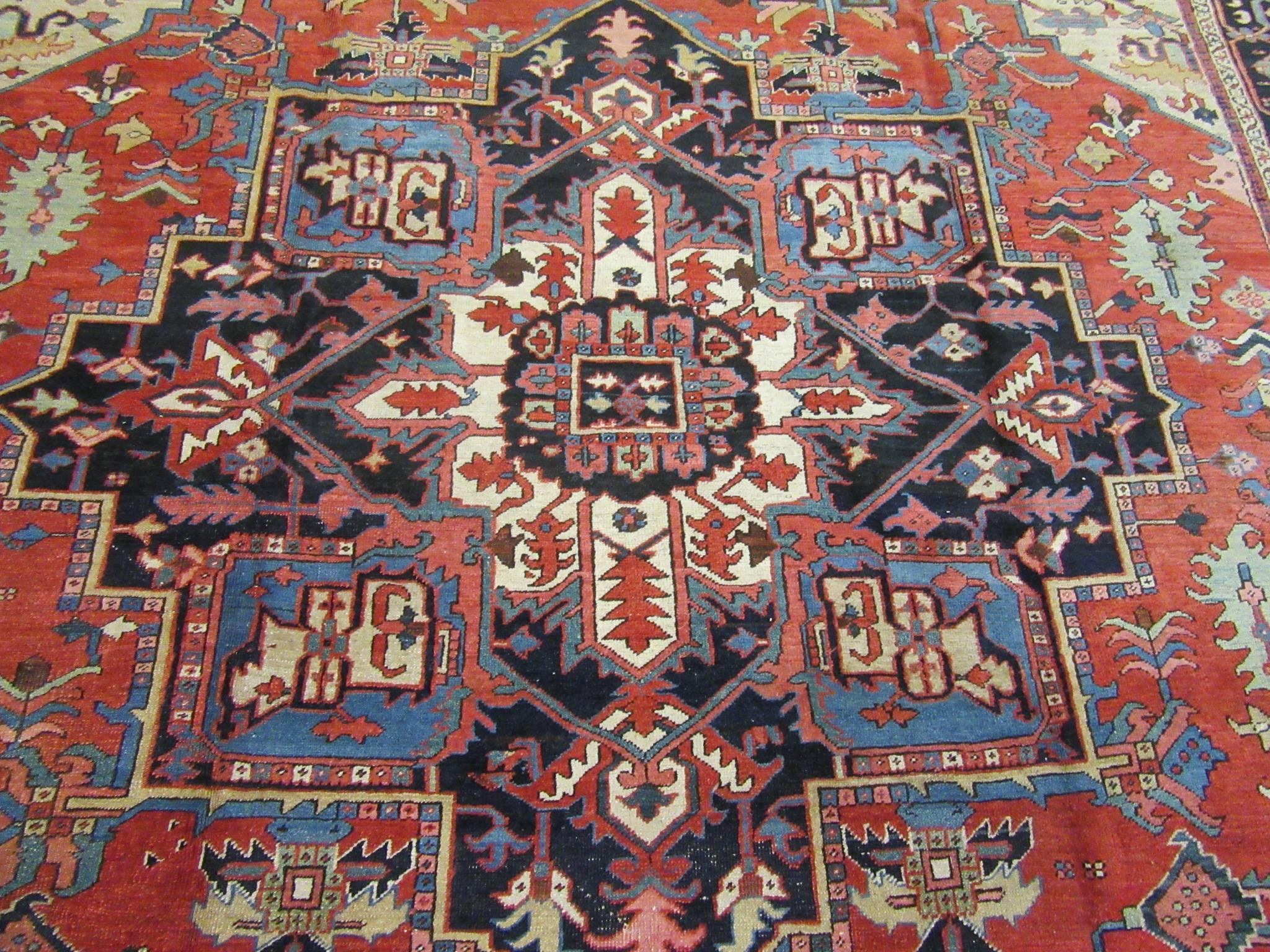 20th Century Antique Hand-Knotted Wool Persian Serapi Rug For Sale