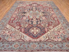 Antique Hand Knotted Wool Red and Blue Persian Serapi Rug