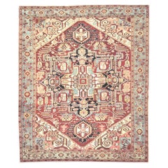 Antique Hand Knotted Wool Red and Blue Persian Serapi Rug