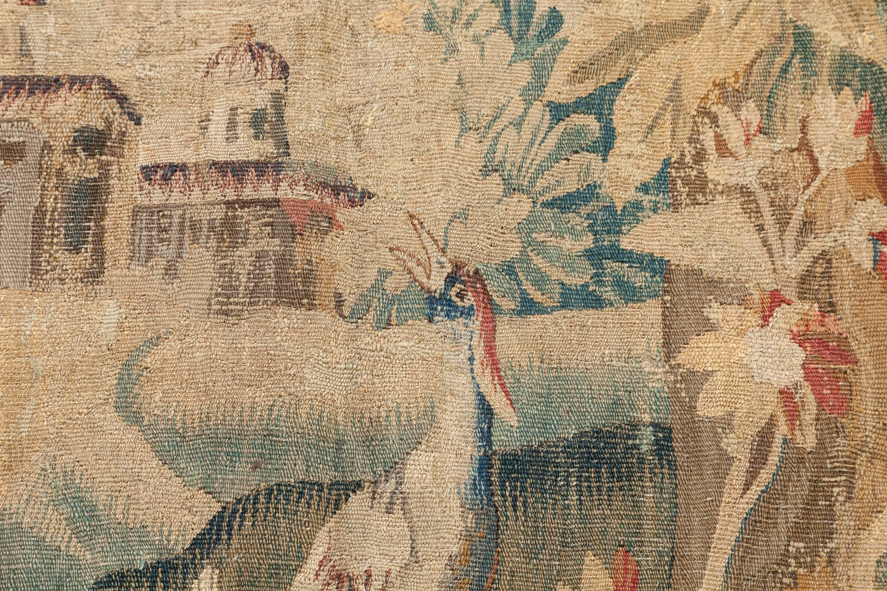 A hand-loomed landscape with stream tapestry from Aubusson, France dating to the late 17th century. A particularly interesting and beautiful composition.