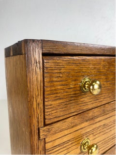 Antique hand made rustic miniature chest of drawers.