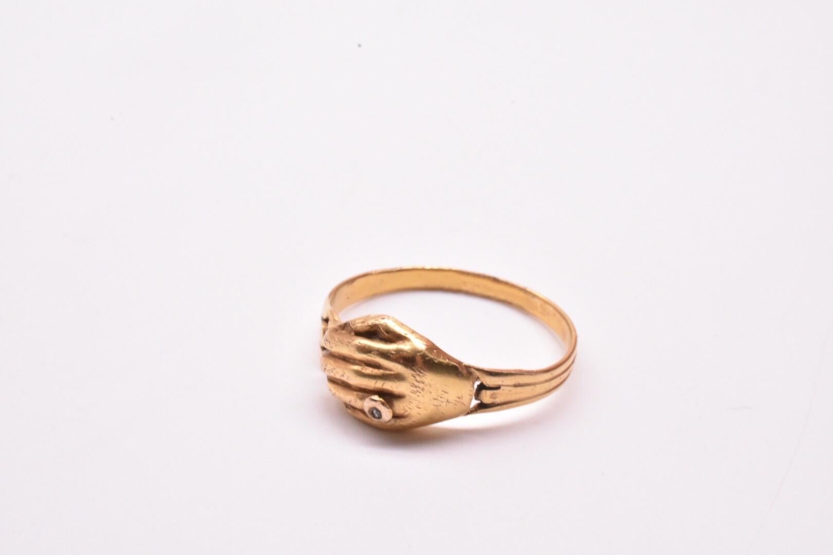 clasped hands ring