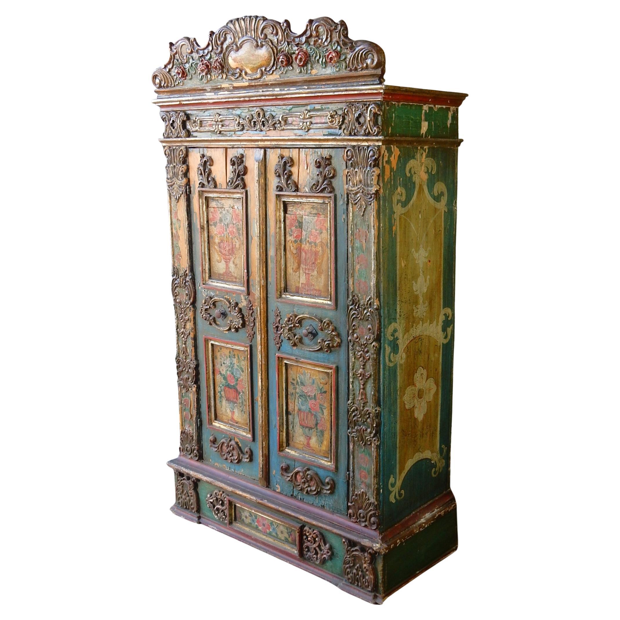 Armario de boda artesanal y pintado, procedente de Alemania, firmado y fechado en 1852.
Completamente original con mucha pintura desconchada.
